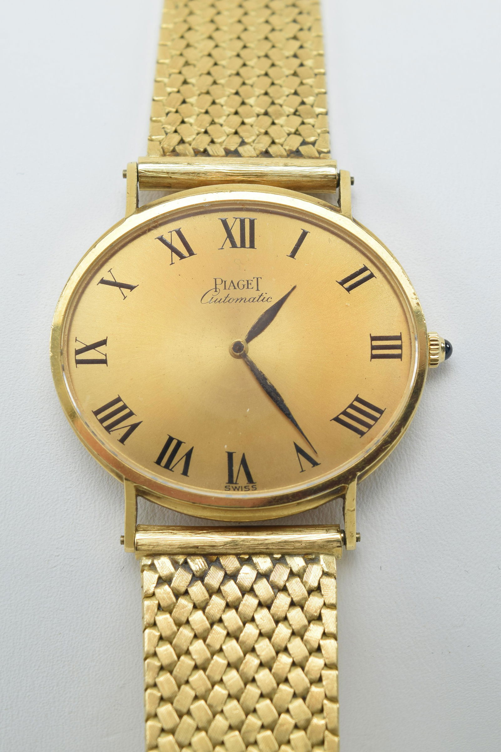 Piaget Automatic elliptical watch, ref. 12501. 18K yellow gold, with a gold bracelet by Corum. Case (1 of 11)