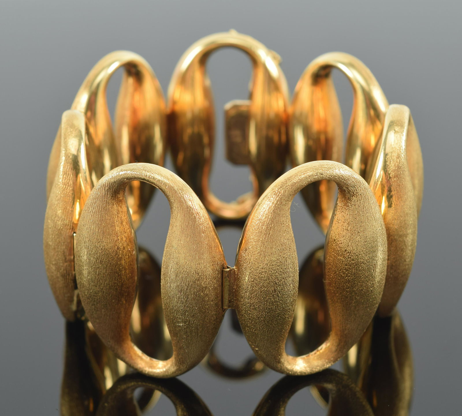 18K brushed gold mid century modern large loop design bracelet. Marked 18K and 750. Approx. 2.25in (1 of 8)