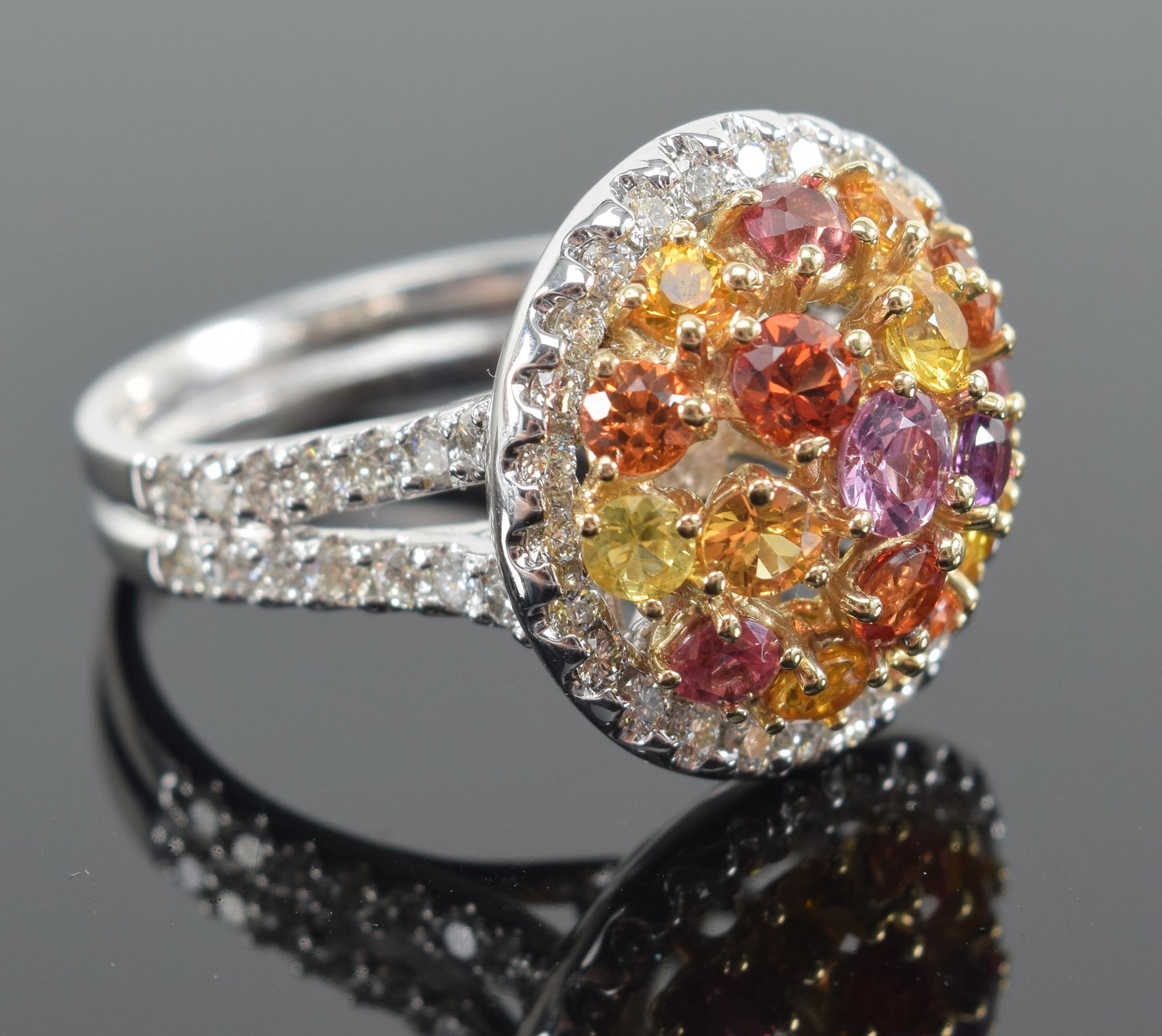 14K gold diamond and multi colored stone mounted ring. Diamonds, topaz, colored sapphires. Approx. (1 of 7)