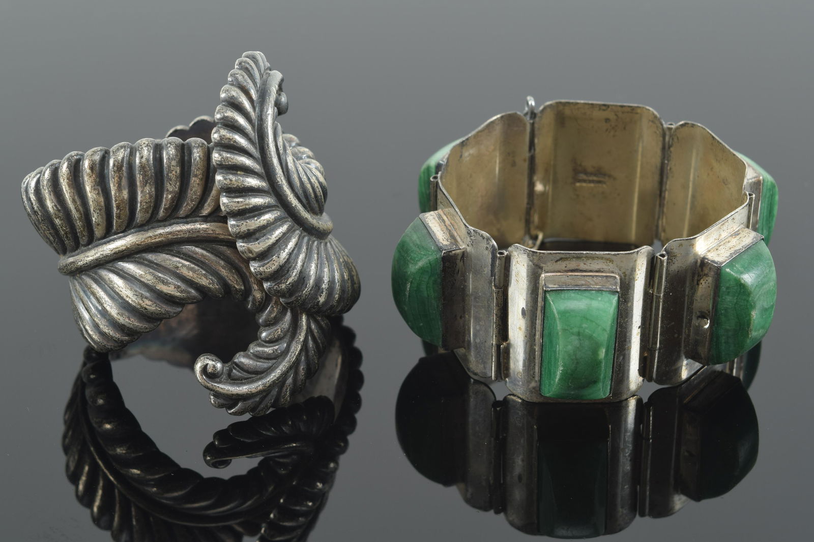 2 vintage silver cuff bracelets. 1) Malachite mounted marked 925. Wear to stones and bracelet. 2) (1 of 10)
