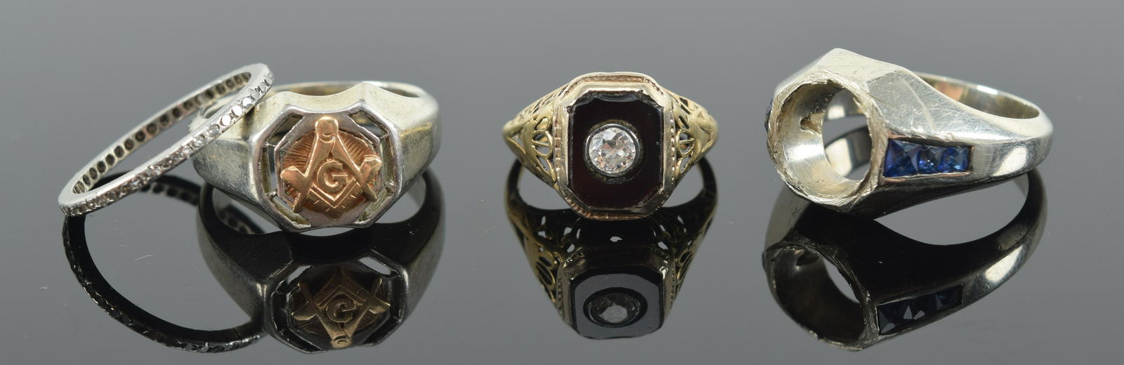 4 rings. 1) 14K white gold ring missing stone. 3 blue stone mounts on each side. Unmarked. 2) 18K (1 of 9)