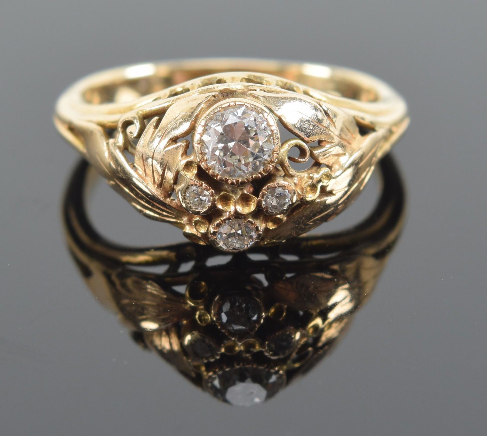 Antique diamond mounted gold ring. Arts and Crafts pierced leaf decoration. Unmarked. Tests as 14K. (1 of 6)