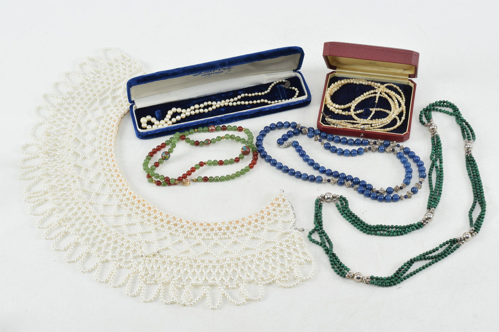 6 piece lot. 1) Silver mounted blue stone bead necklace. 2) Malachite and silver bead necklace. 3) (1 of 9)