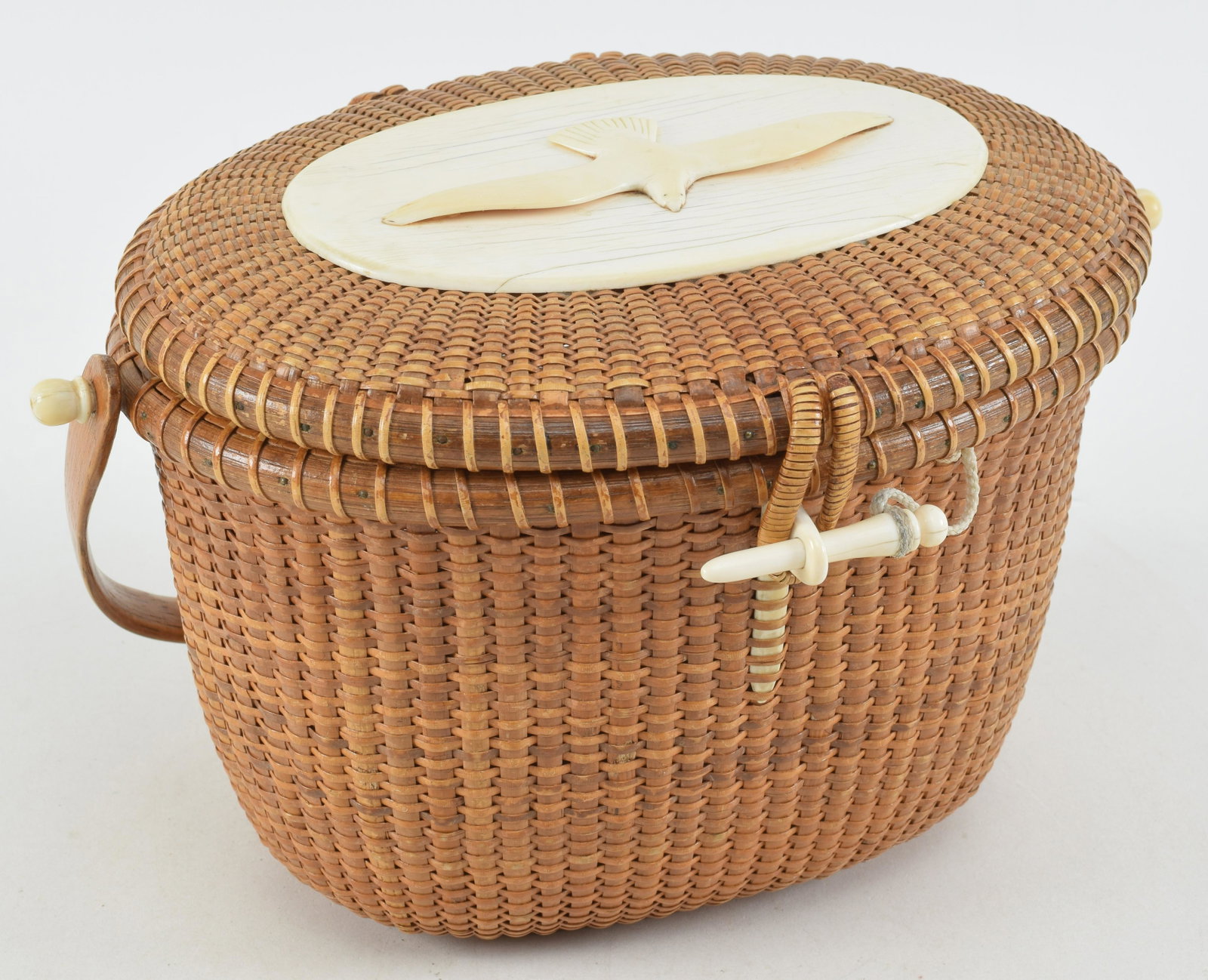 Original Jose Formoso Reyes 1966 Nantucket pocket book basket. Seagull plaque on top. Signed on: Original Jose Formoso Reyes 1966 Nantucket pocket book basket. Seagull plaque on top. Signed on base. Inscribed inside cover. Appears to be no breaks. Overall: 10.75 W x 7in H x 8 D.