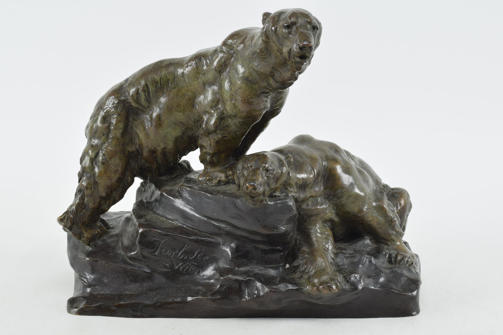 Otto Jarl, Austrian patinated bronze of two polar bears on a rock out cropping. Signed on rock at: Otto Jarl, Austrian patinated bronze of two polar bears on a rock out cropping. Signed on rock at center. Nice dark verdigris patina on bears and deep bronze on base. Height 10, width 11.5 in