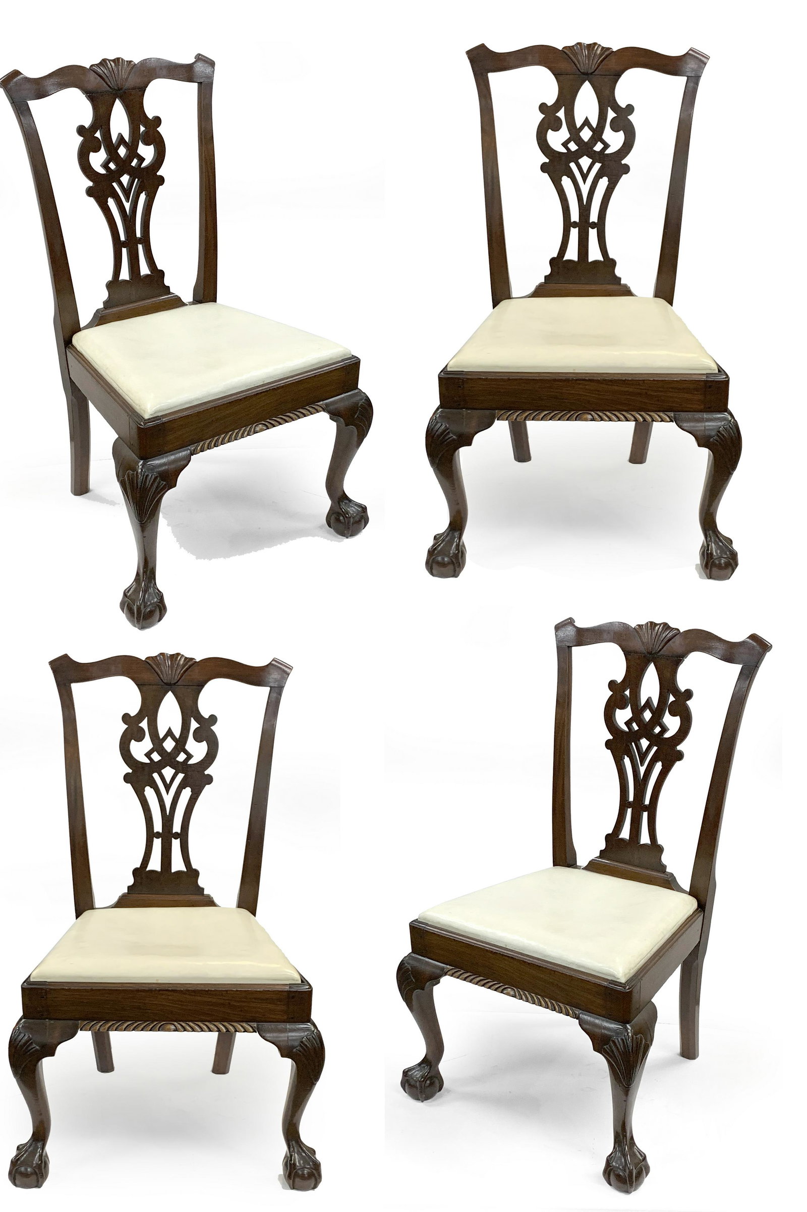 Set of 4 fine chippendale style dining chairs, 19th Century. Shell carved shaped crests, pierced: Set of 4 fine chippendale style dining chairs, 19th Century. Shell carved shaped crests, pierced backplate, shell knees and ball and claw feet. Slip seats with maple or cherry frames. restoration to b