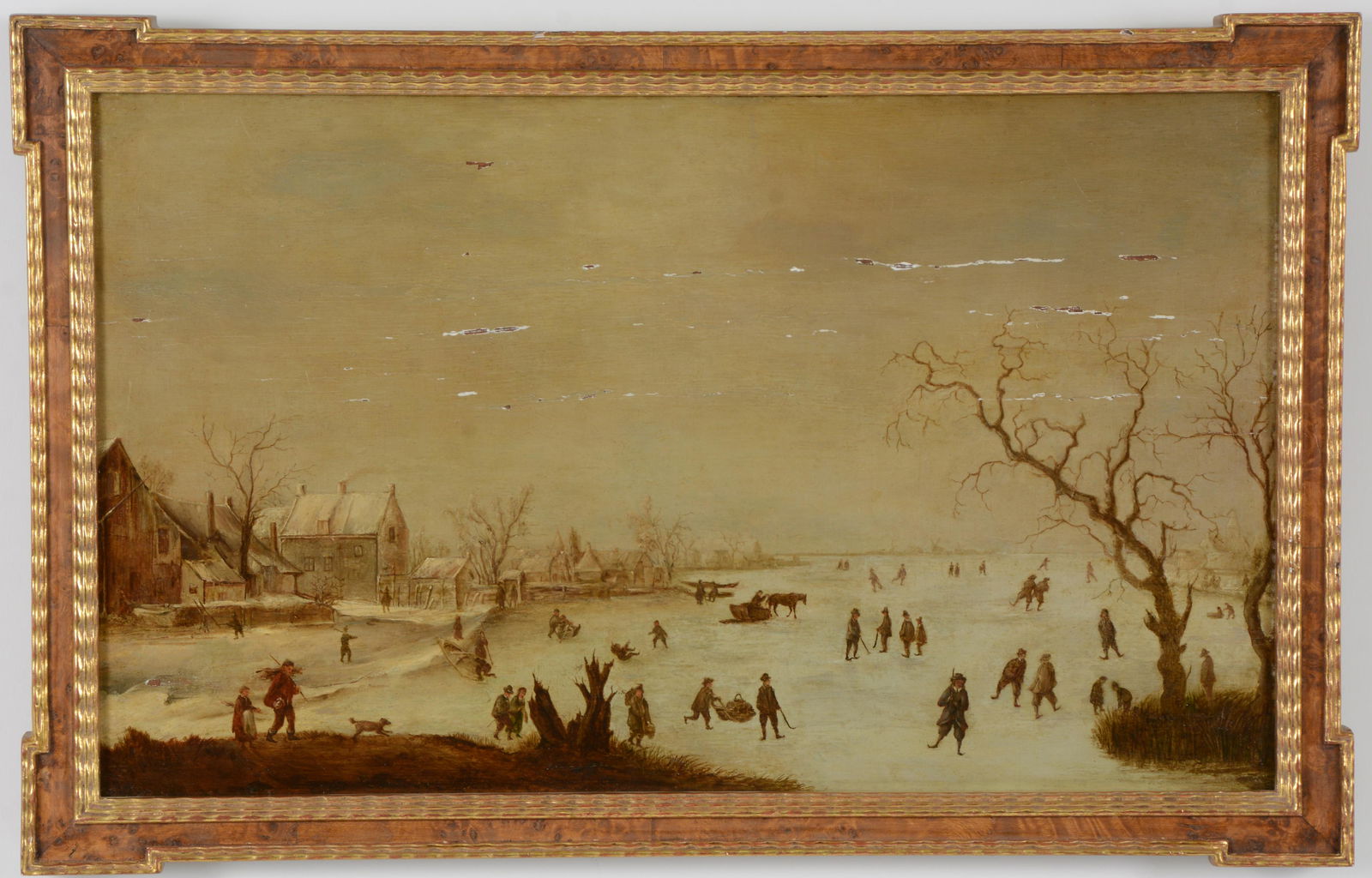 18th/19th century old master Dutch school winter skating scene. Frozen river in village. Oil on: 18th/19th century old master Dutch school winter skating scene. Frozen river in village. Oil on panel. Framed. Paint loss and lifting. Sight: 12 x 20in. Overall: 14 x 22in.