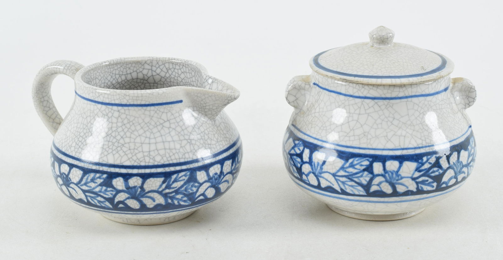 Dedham pottery dogwood pattern cream and covered sugar. Creamer width 5 in (1 of 10)