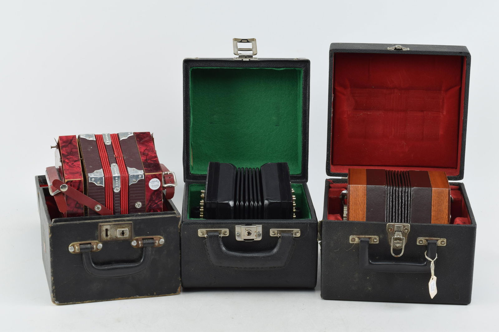 Collection of  3 cased concertinas, 20th Century. One 48 key by Jurgen Sutner, West Germany, one 48 (1 of 11)