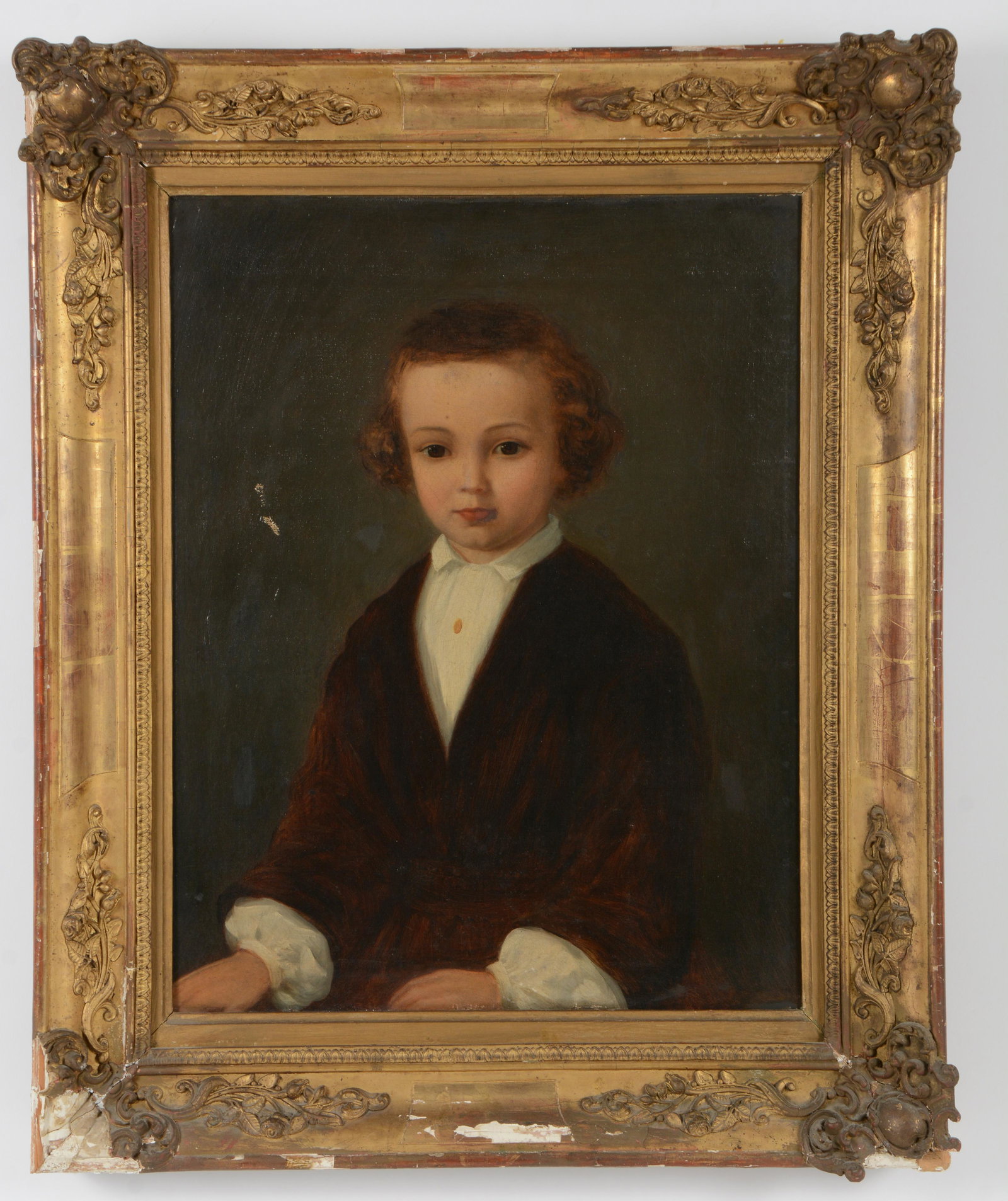 Early 19th century continental school portrait of a young boy. Oil on canvas. Framed. Abrasion left: Early 19th century continental school portrait of a young boy. Oil on canvas. Framed. Abrasion left center. Other minor abrasions. Craquelure. Losses to frame. Sight: 20 x 24in. Overall: 32 x 26in.