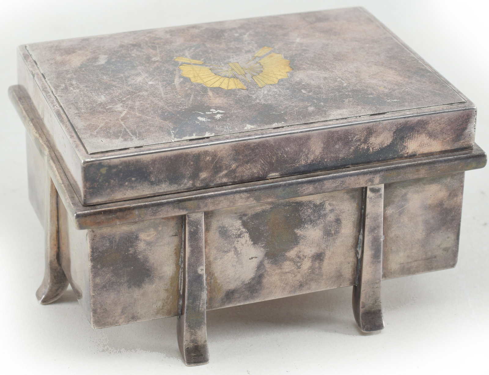 Heavy silver box. Japan. Early 20th century. Footed coffer shape with a gilt fan crest. Marked pure (1 of 10)