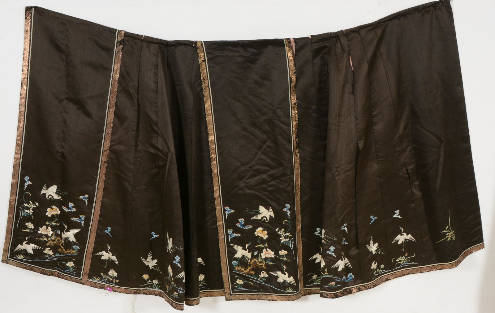 Chinese late Qing period black ground crane decorated silk embroidered skirt. (1 of 5)