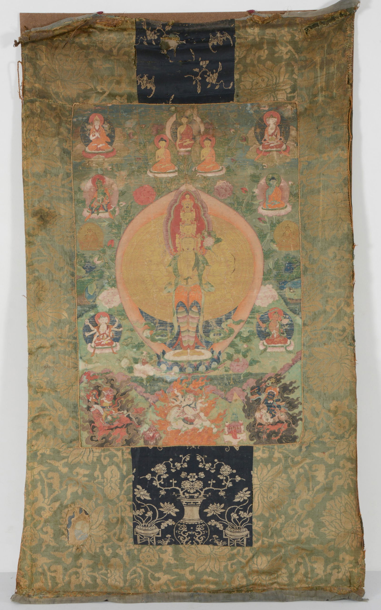 Buddhist icon. Tibet. 18th century. Thangka of the 11 headed 1000 armed Kuan Yin with surrounding (1 of 9)