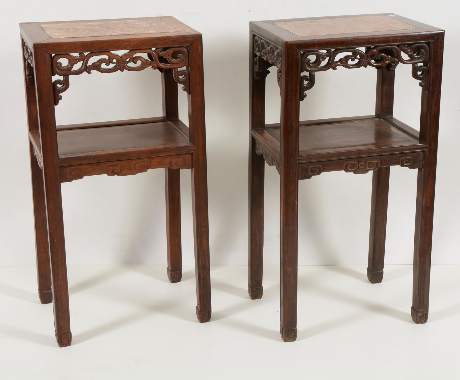Pair of Chinese hardwood and marble inset stands, early 20th Century. Rectangular with carved apron (1 of 4)