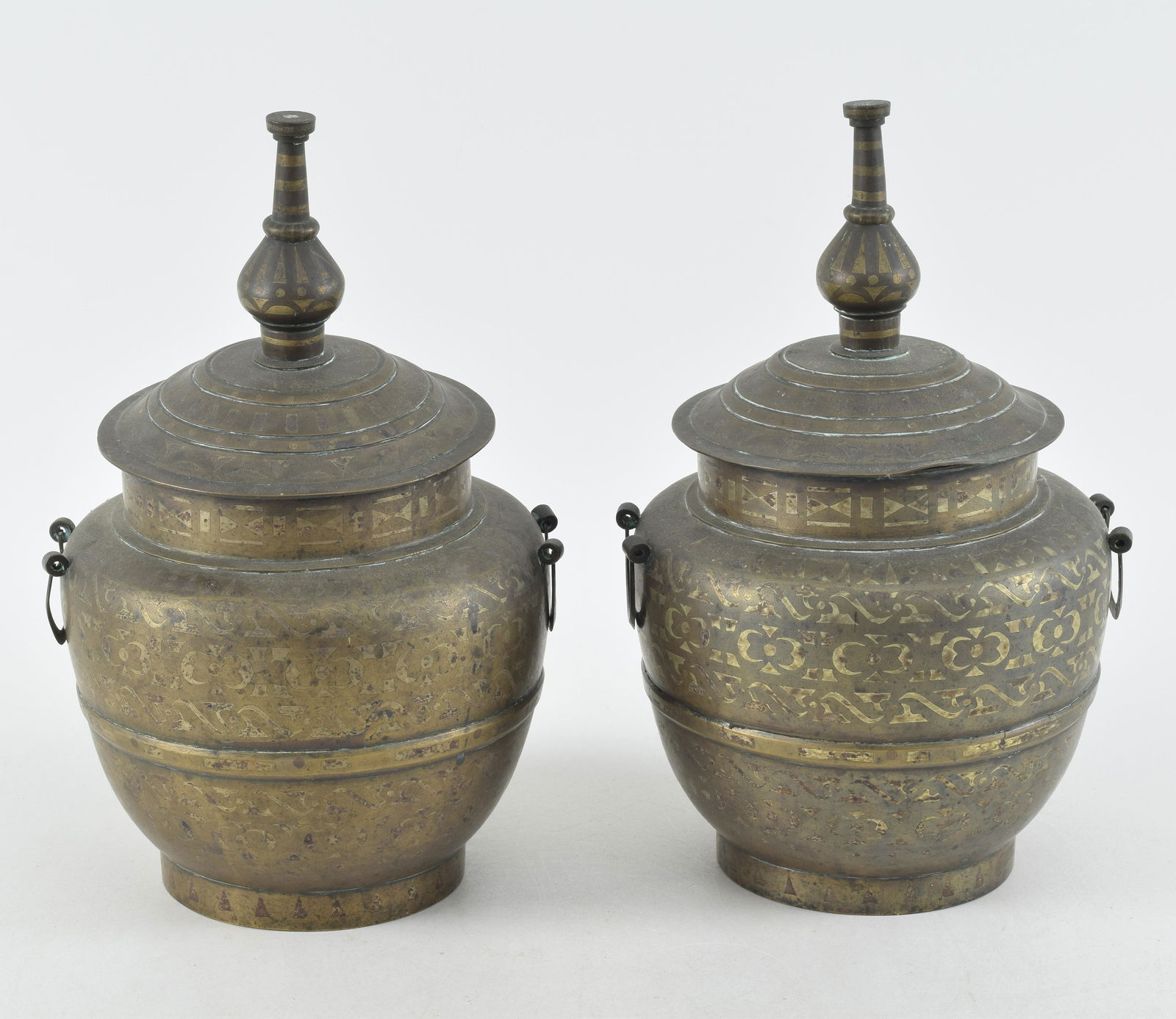Pair of brass covered jars. Borneo or the Philippines. Early 20th century. 12in high. (1 of 8)