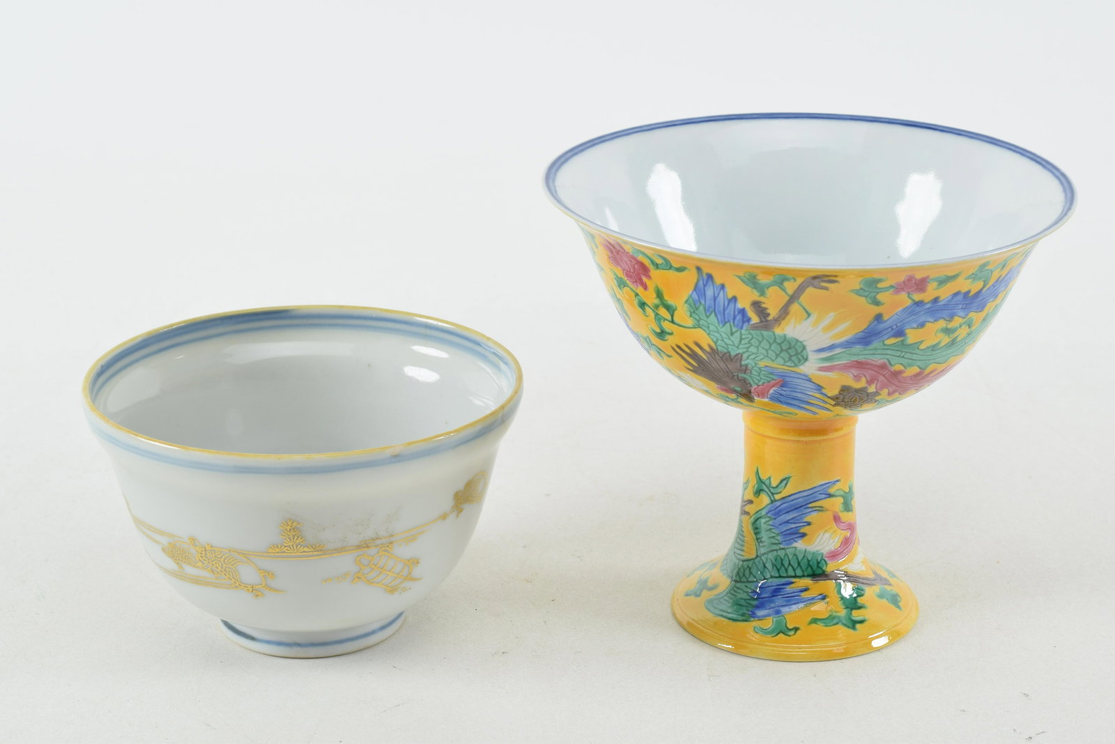 2 piece Chinese porcelain lot. 1) Early underglaze blue decorated cup with gilt landscape. 2) Yellow (1 of 10)