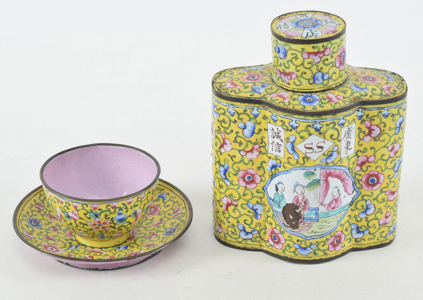 Two pieces of canton enamel. China. 19th century. To include a tea caddy marked SS and a wine cup.: Two pieces of canton enamel. China. 19th century. To include a tea caddy marked SS and a wine cup. Yellow ground with floral scrolling. Tea caddy 5.5in high.