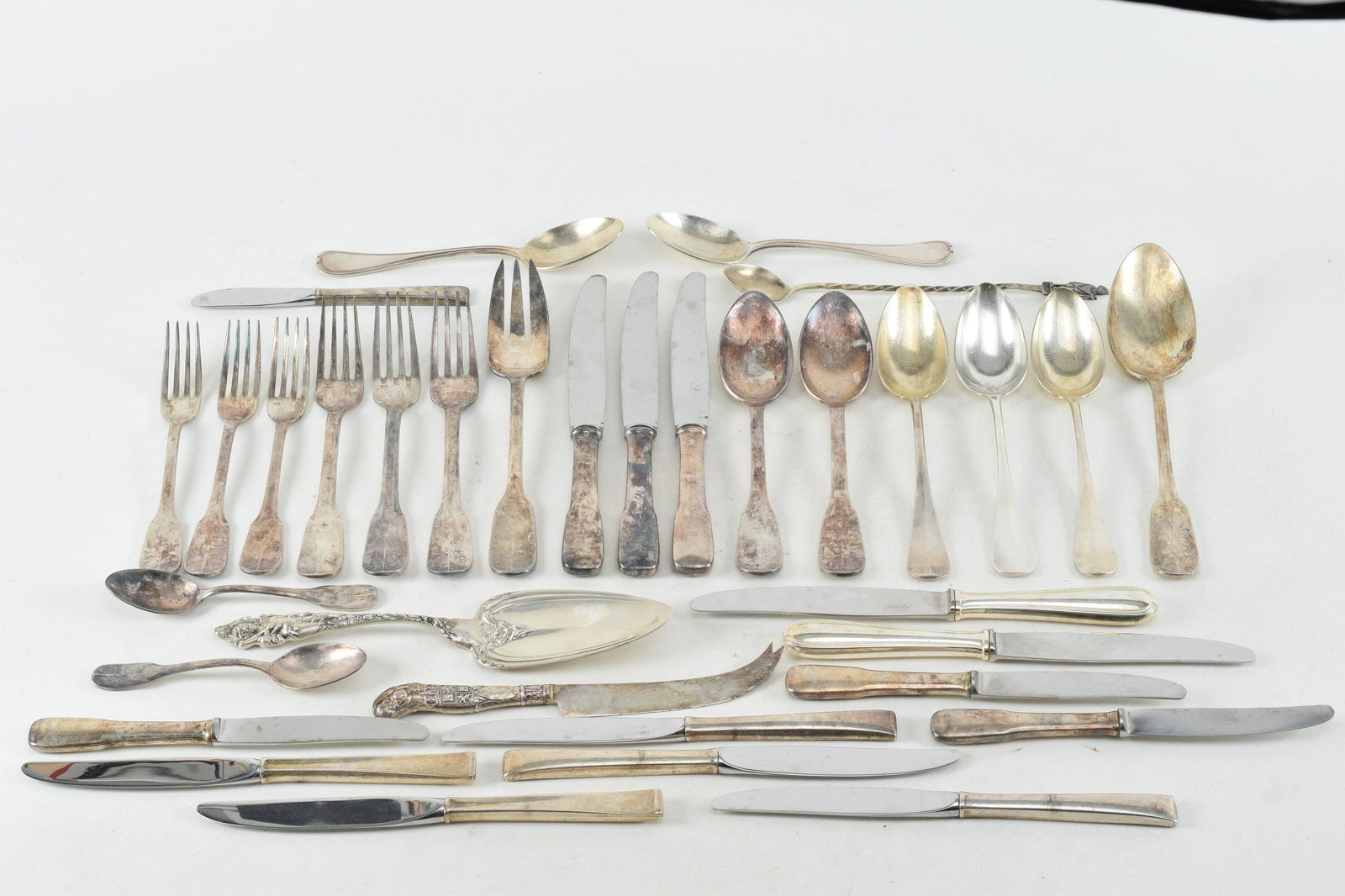 34 Assorted Continental flatware items including Christofle, serving items and a Loved Disarmed pie: 34 Assorted Continental flatware items including Christofle, serving items and a Loved Disarmed pie server.