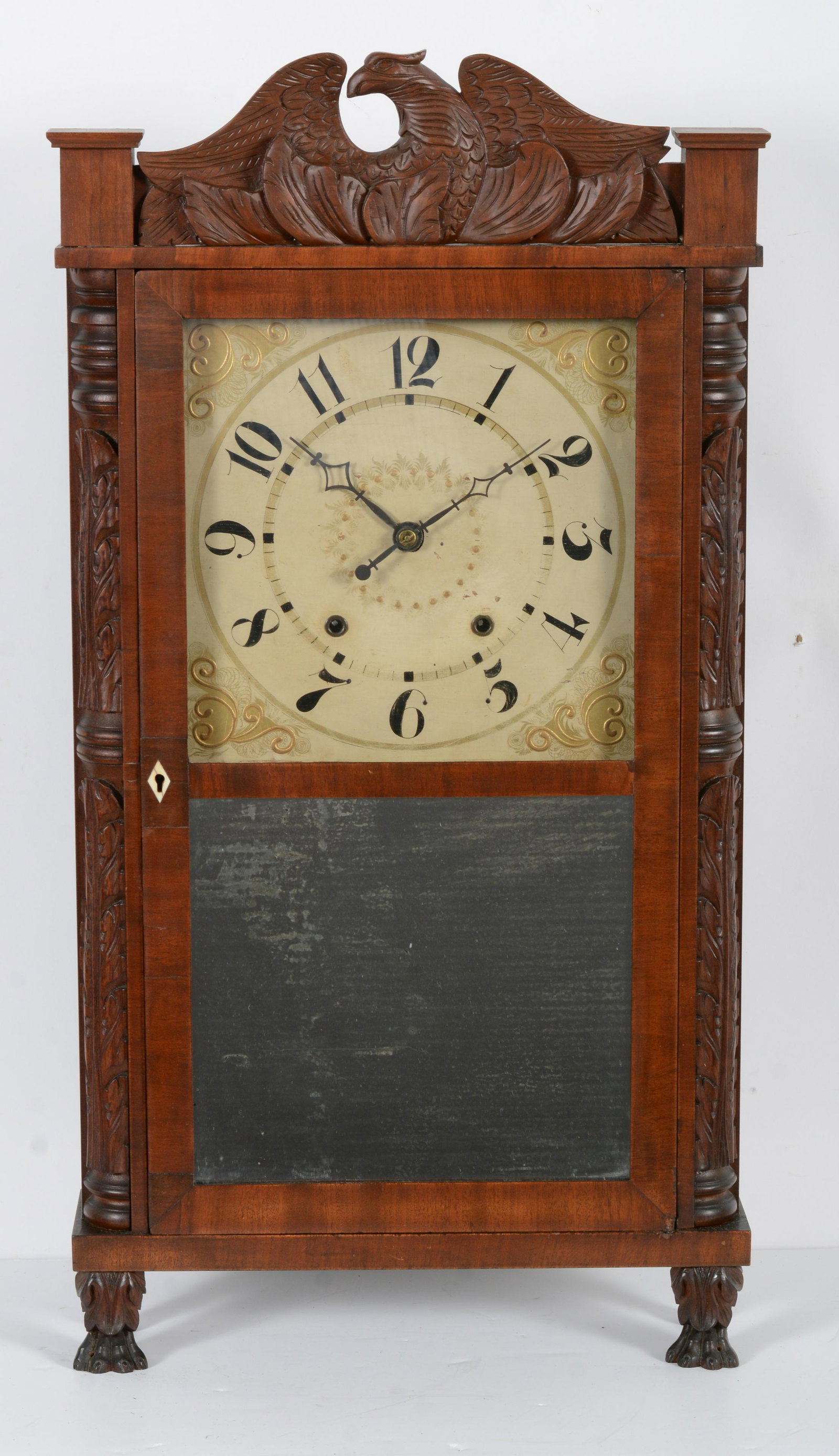 Eli Terry Jr. split column mantle clock, Plymouth Connecticut. Eagle crest, with acanthus columns: Eli Terry Jr. split column mantle clock, Plymouth Connecticut. Eagle crest, with acanthus columns and paw feet. Height 33. Width 17 in Refinished, not running