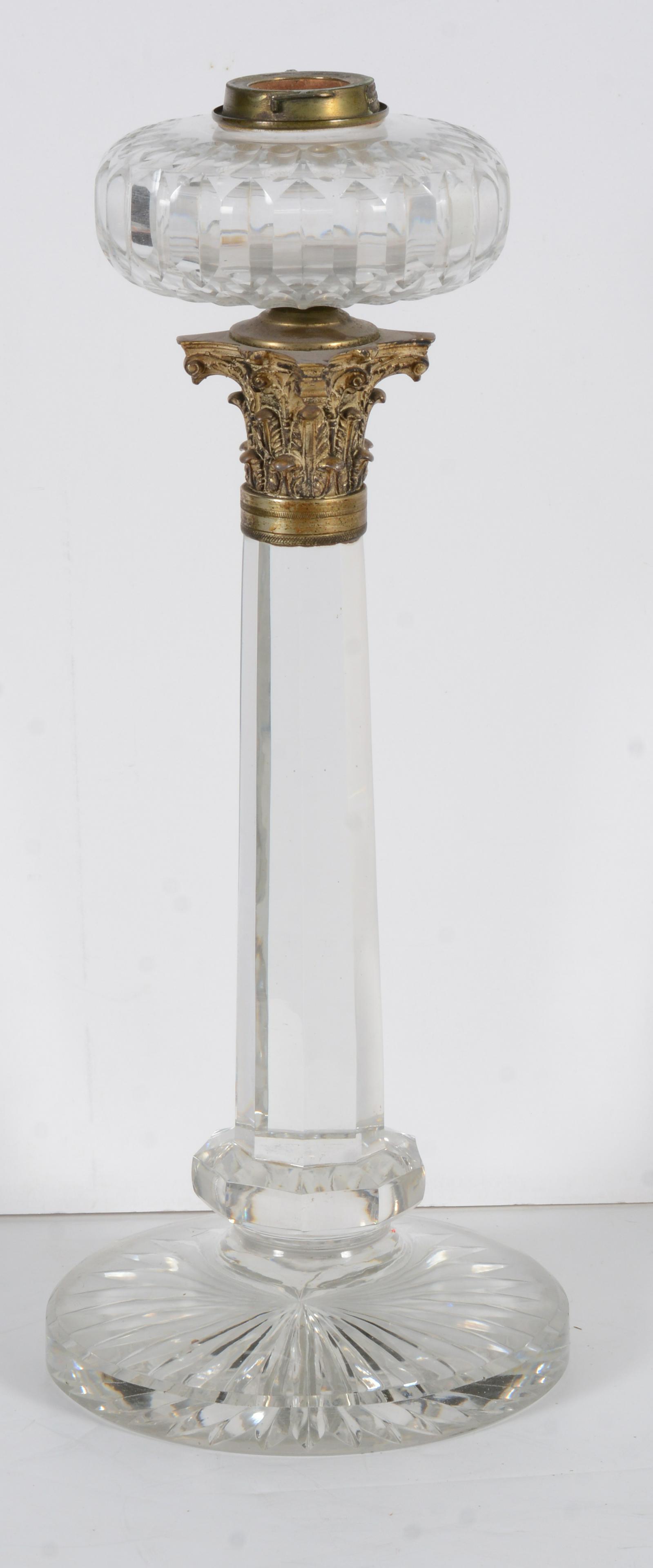 Early Baccarat style heavy cut crystal lamp with gilt metal column capital. Lamp hardware marked: Early Baccarat style heavy cut crystal lamp with gilt metal column capital. Lamp hardware marked King & Browne London. Replaced upper shade. Scratches to base. Overall height: 32in.