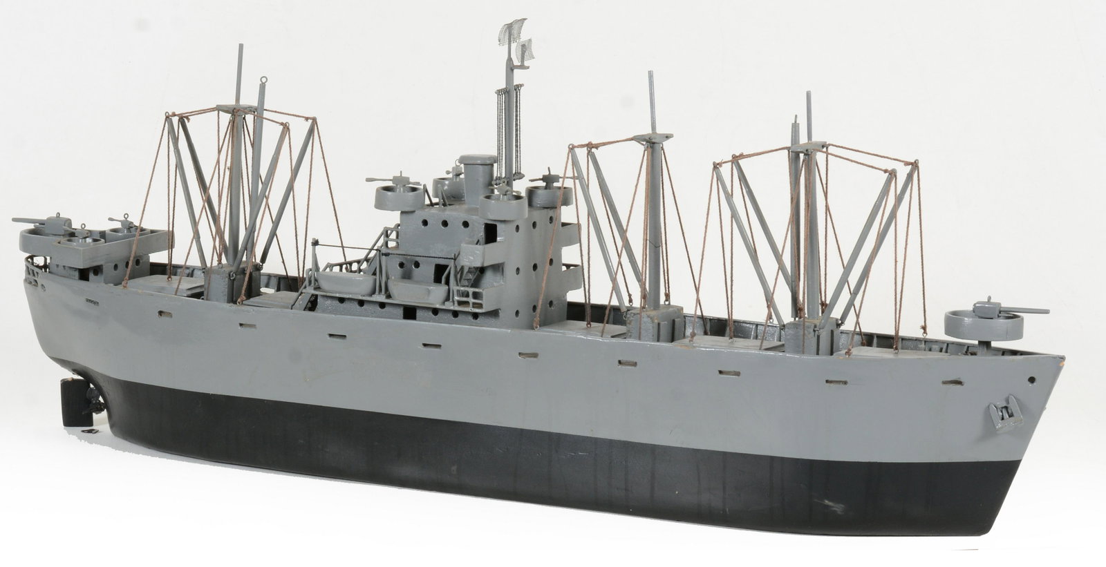 WWII Liberty Cargo Ship Model an X-Niagara Maritime Museum Display. This quality made wood display: WWII Liberty Cargo Ship Model an X-Niagara Maritime Museum Display. This quality made wood display has nice overall detail. The original grey and black paint is present and appears to be made with det