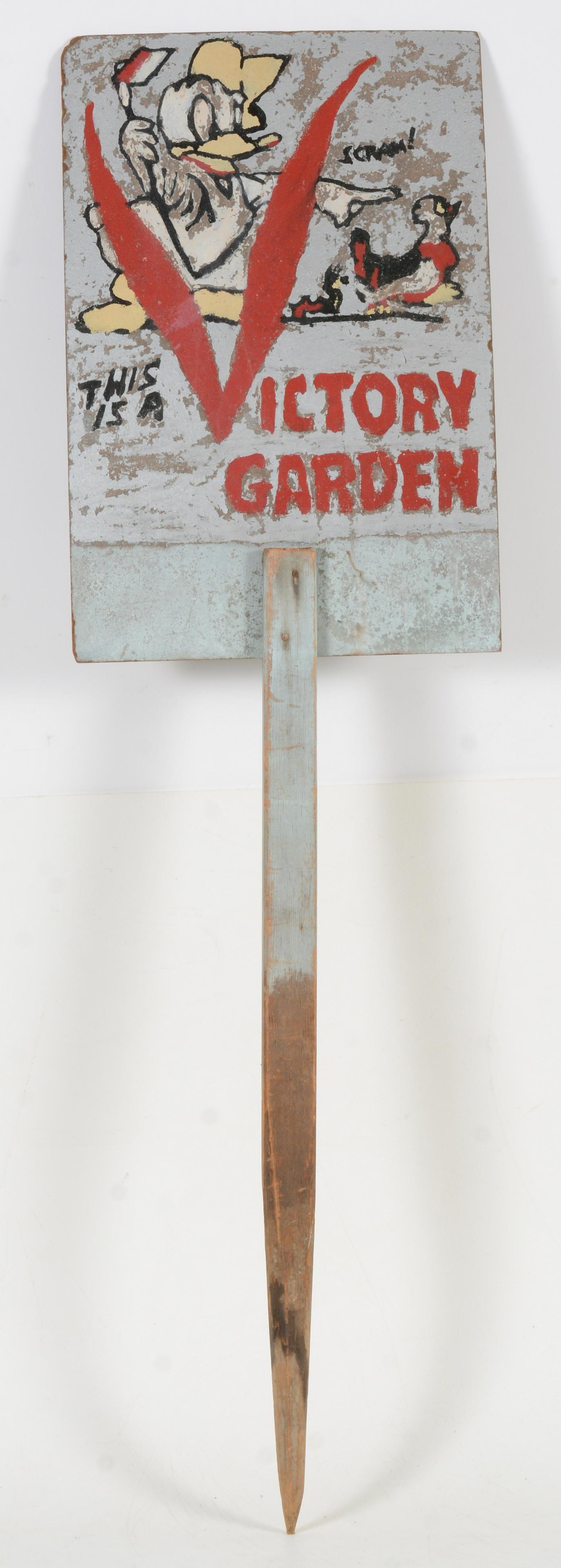 WWII Original Hand Painted Folk Art Victory Garden Sign. This hand painted and crafted Donald Duck: WWII Original Hand Painted Folk Art Victory Garden Sign. This hand painted and crafted Donald Duck sign is on Masonite board with a wooden stake pole. Appears to be a period sign copying a printed sig