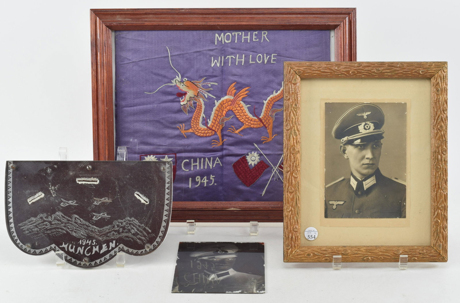 Lot of Four WWII Era Items. Framed picture of German Soldier, A negative glass plate of the same: Lot of Four WWII Era Items. Framed picture of German Soldier, A negative glass plate of the same picture, A plexiglass etched MÃ¼nchen 1945 aerial scene of fighter planes, and a China 1945 Silk that