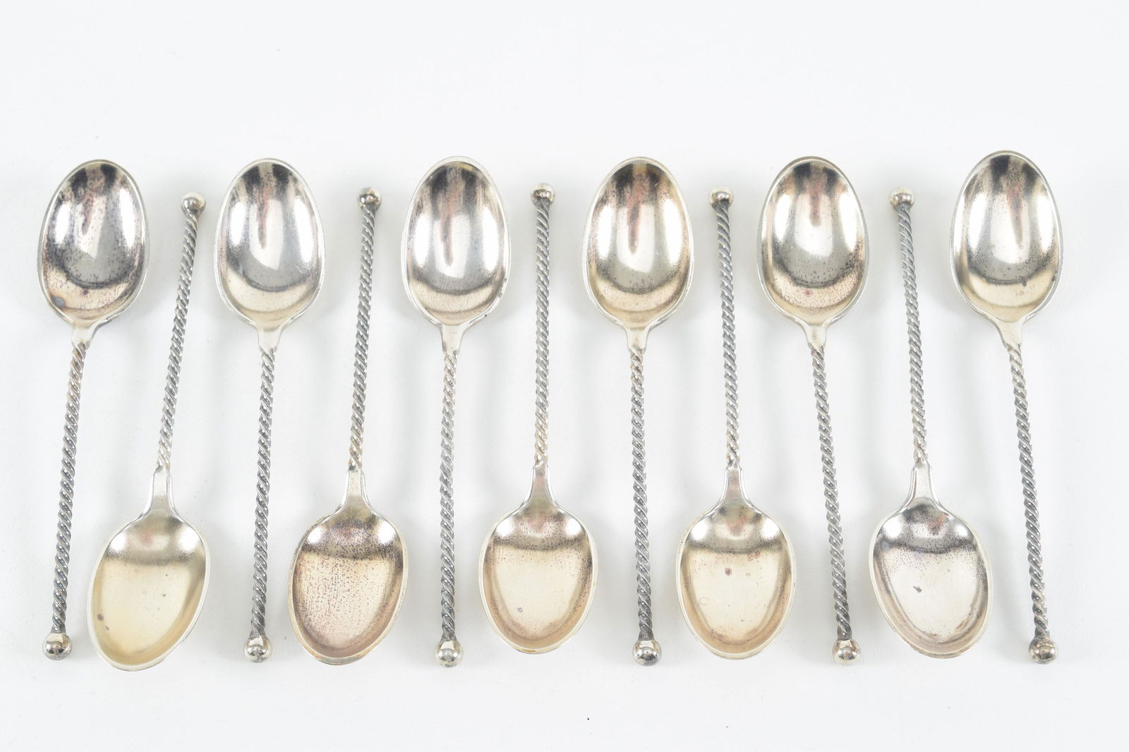 Set of 11 sterling silver twist handle demitasse spoons. Monogrammed S.C.E. and dated '83 on reverse (1 of 4)
