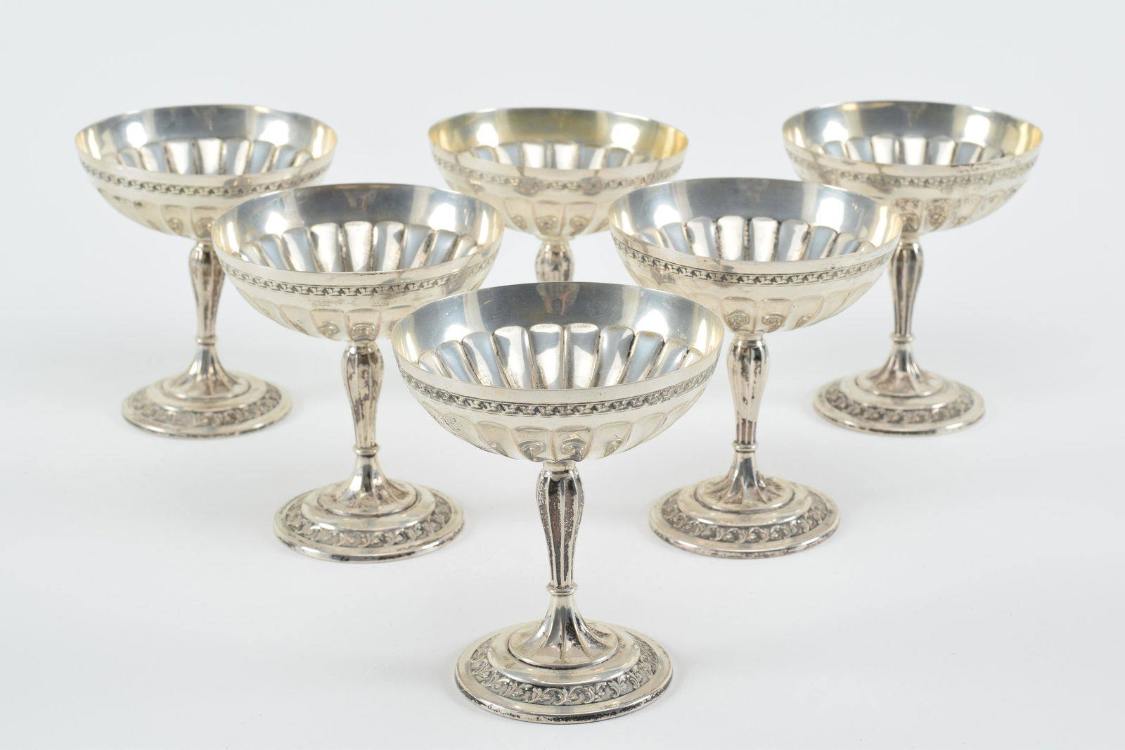 19th century German 800 silver dessert cups. Fluted bowls and stems with embossed foliate bands (1 of 7)