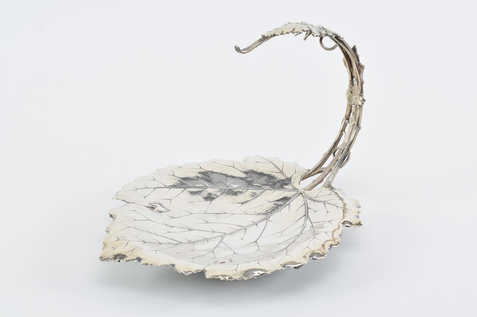 Unusual Gorham sterling silver grape server. Naturalistic leaf and vine form. Footed base. Underside (1 of 8)