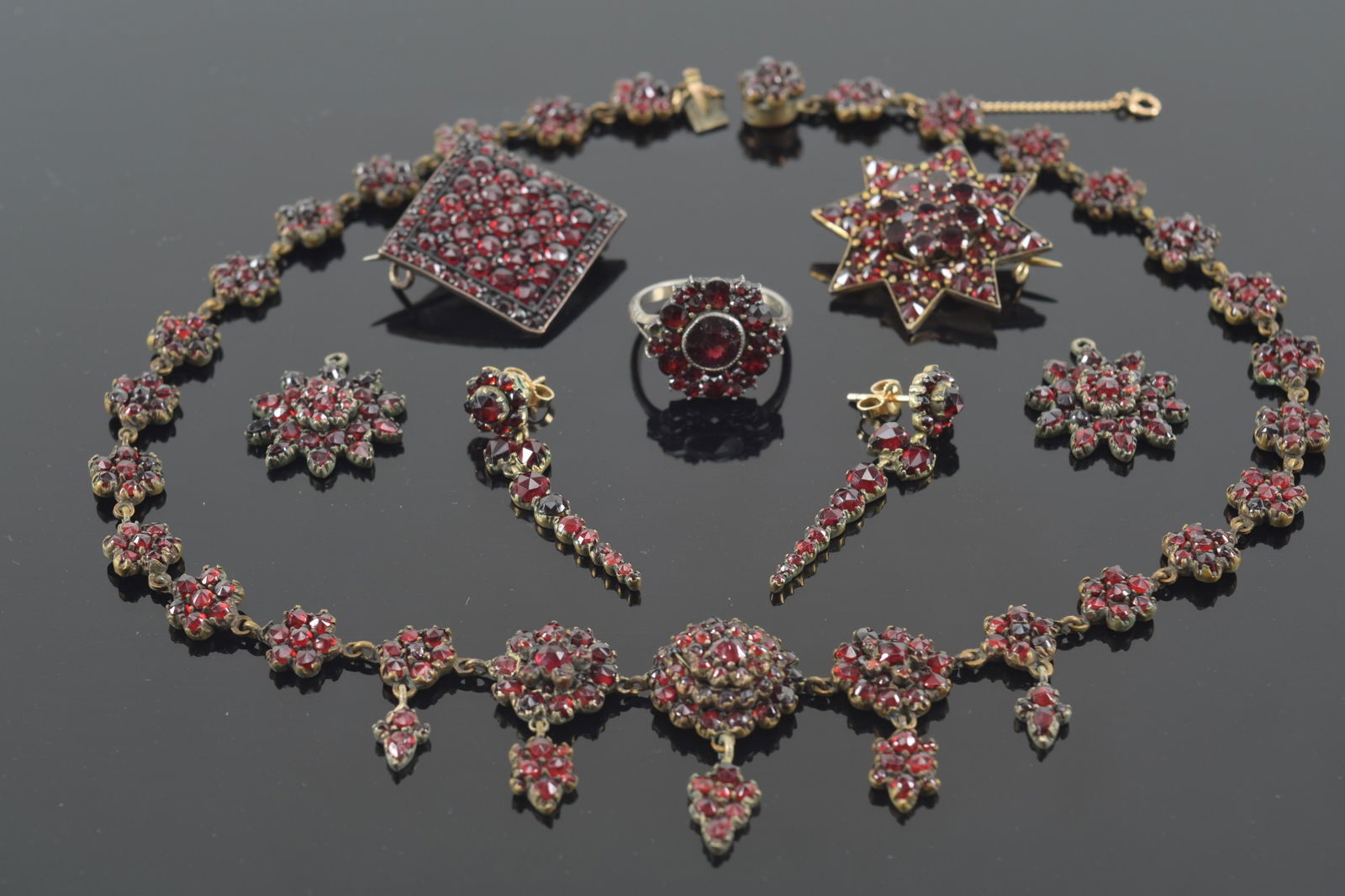 Victorian garnet jewelry suite. 1) 0.9in square silver pin. 2) Gilt silver back star pin. 1.2in (1 of 12)