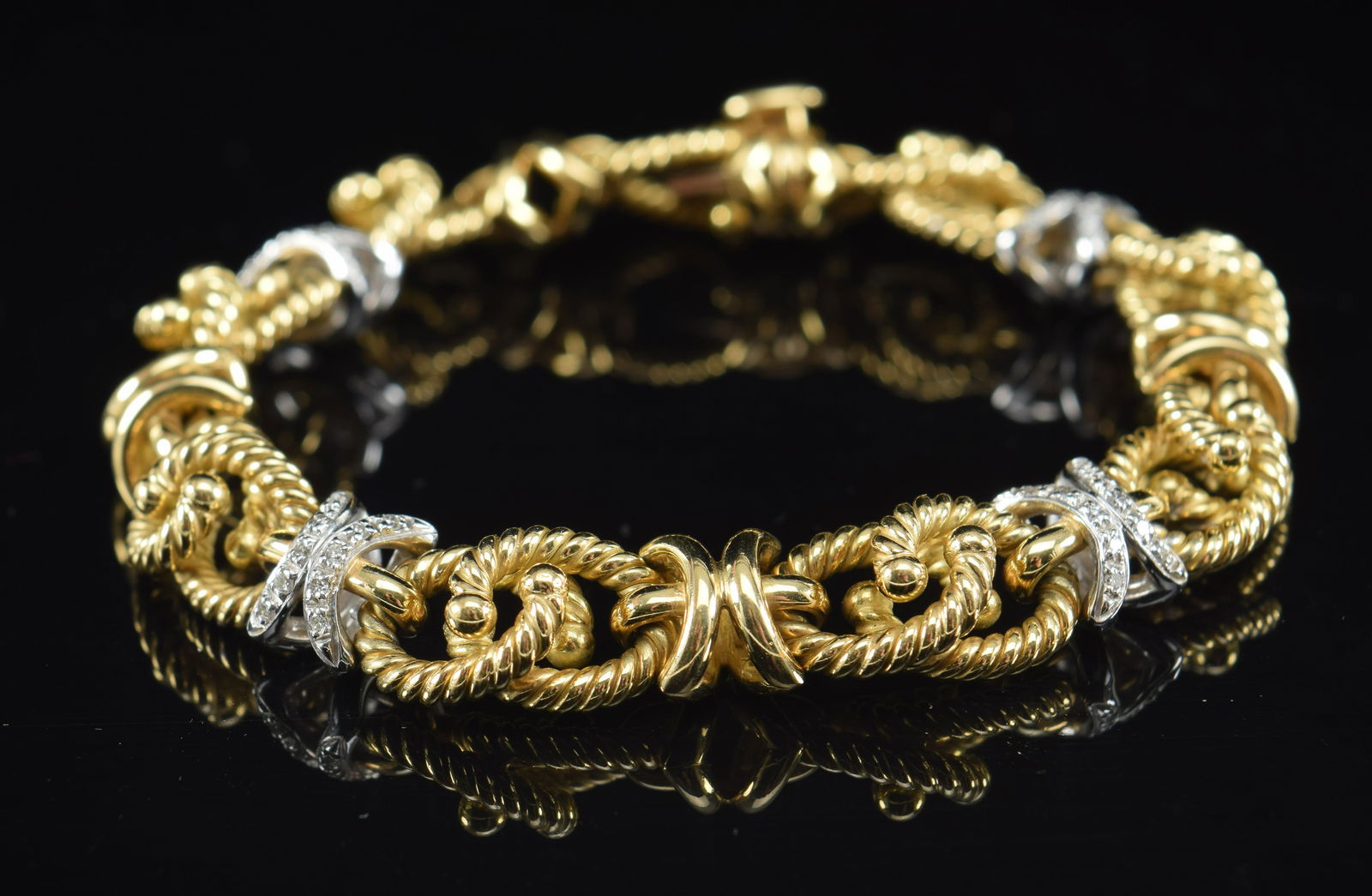 Heavy 18K gold diamond bracelet. Yellow gold link bracelet with diamond set white gold sections. 40 (1 of 7)
