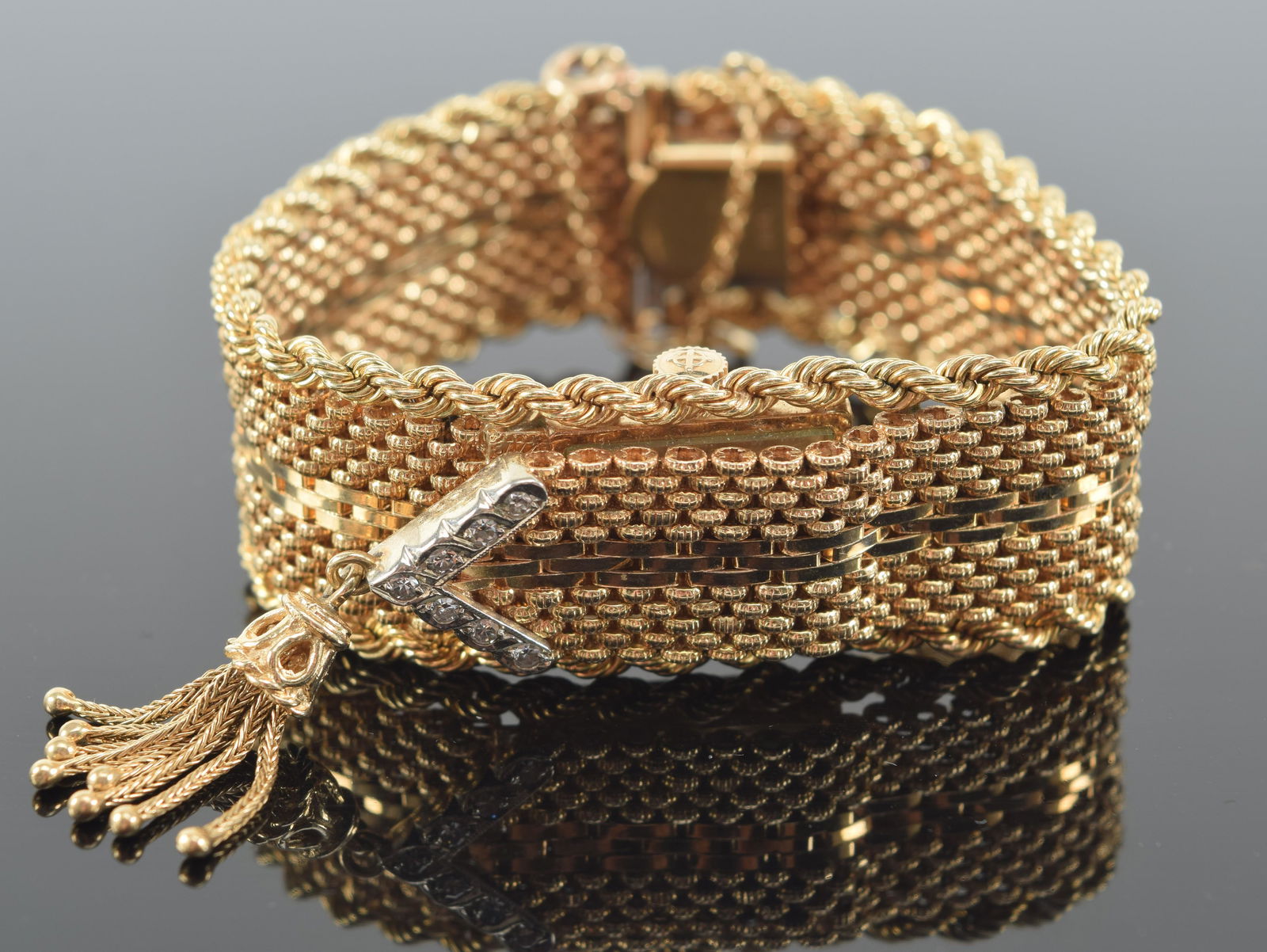 14K gold heavy zodiac bracelet wristwatch and band. Diamond mounted elaborate rope braided design. (1 of 6)