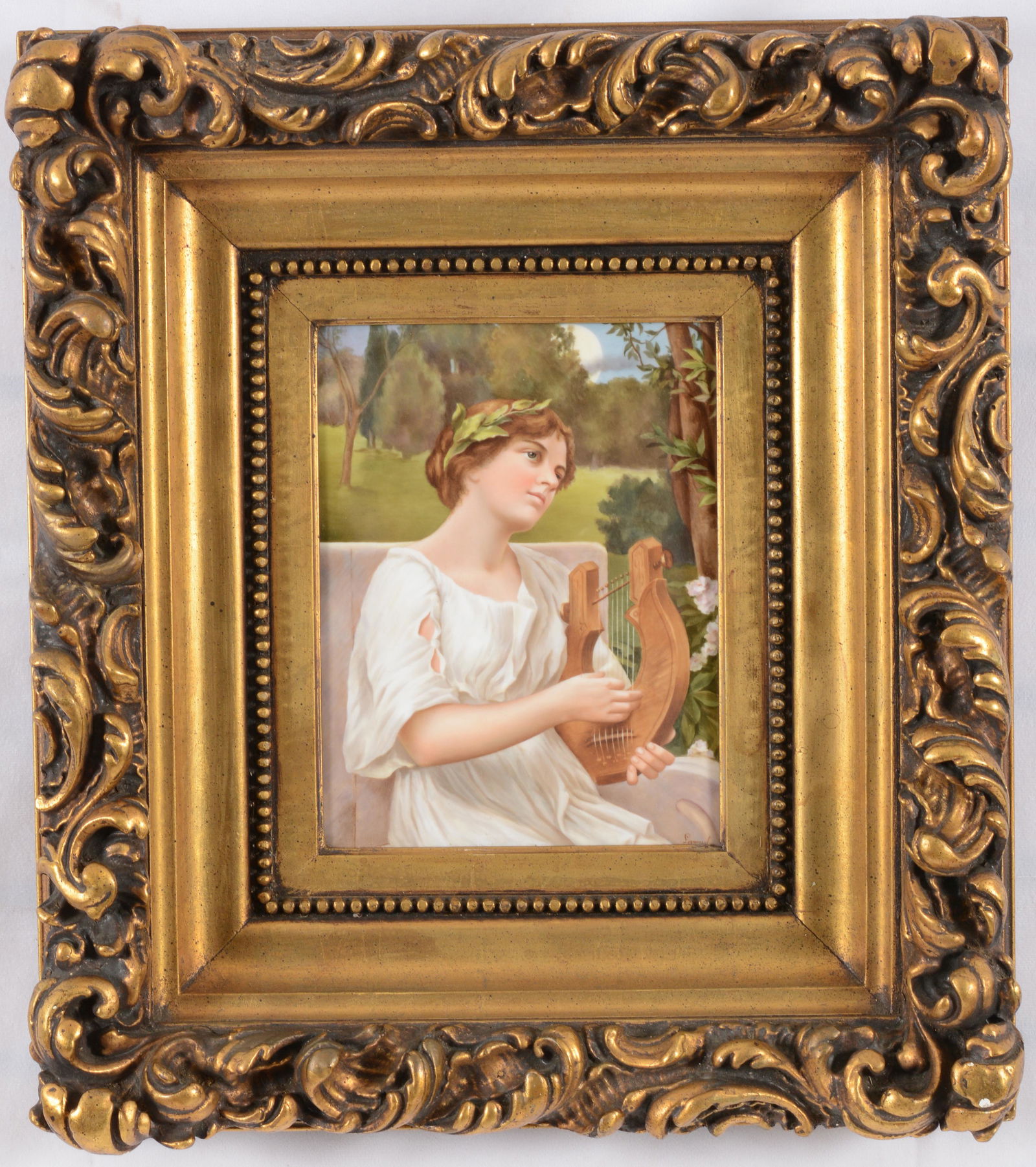 KPM porcelain plaque "Die Nachtigall". Depiction of a classical woman playing a lyre. Artist signed: KPM porcelain plaque "Die Nachtigall". Depiction of a classical woman playing a lyre. Artist signed lower right. Backside with title and impressed KPM mark. Ornate heavy gilt frame. Sight approximatel