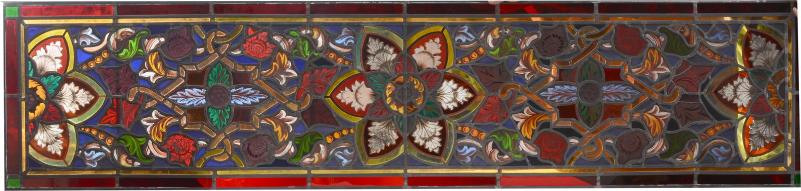 Antique non-ecclesiastic long stained glass panel with geometric and foliate designs. Unframed. (1 of 6)