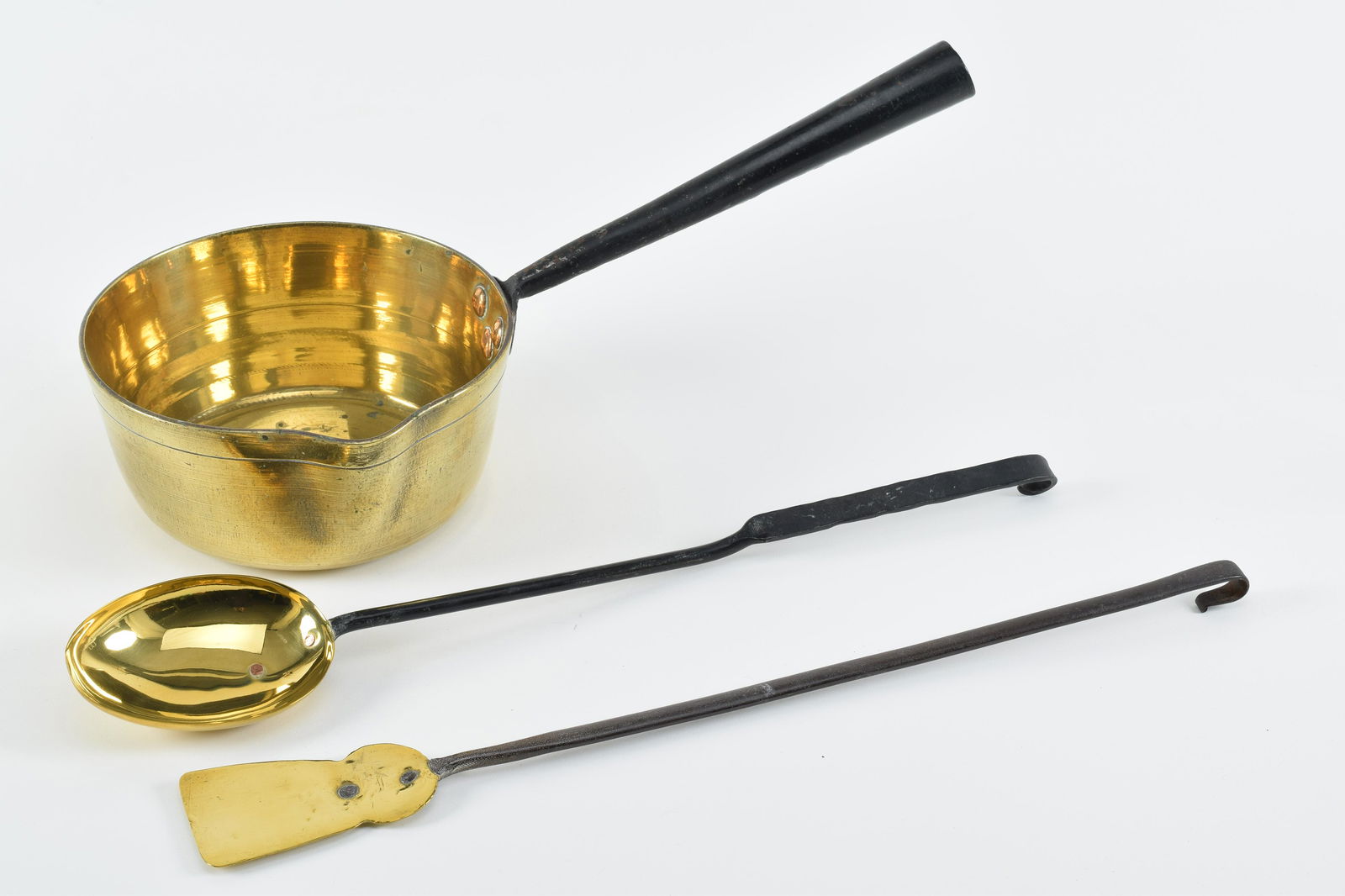 Early 19th Century saucepan with spout together with a spatula and large spoon with wrought handles. (1 of 11)