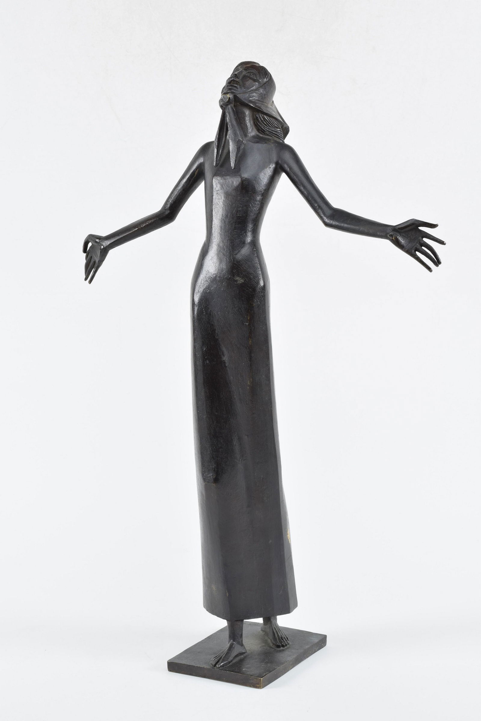 Francois Brochet. "Le Cri". Bronze sculpture of a woman crying out with outstretched arms. Signed on: Francois Brochet. "Le Cri". Bronze sculpture of a woman crying out with outstretched arms. Signed on back of bonnet. Foundry mark on base. Edition number 7/8. Scuff to lower side of dress. 23in high.