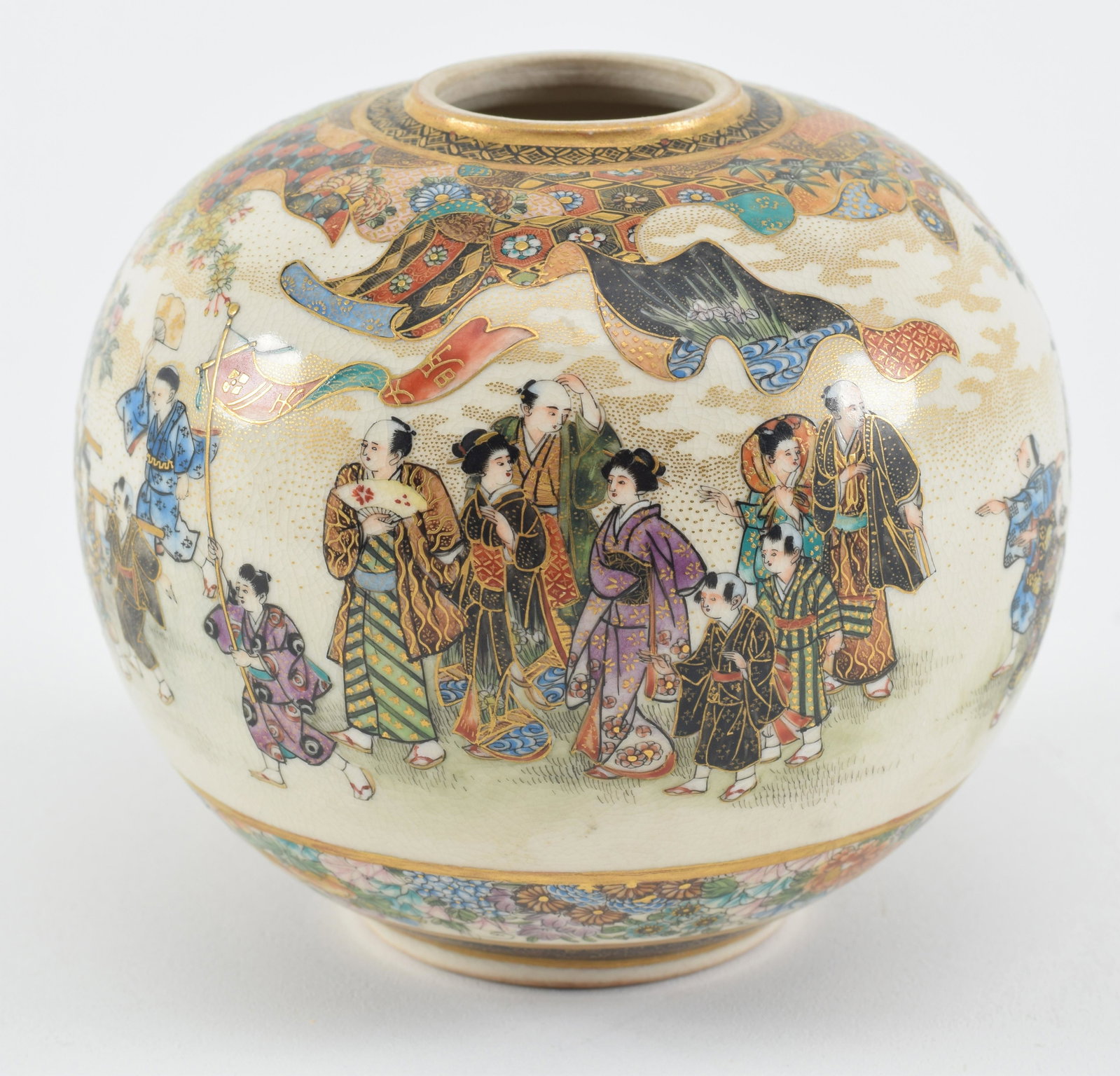 Satsuma vase. Japan. Meiji period (1868-1912). Globular form. Decoration of a children's festival: Satsuma vase. Japan. Meiji period (1868-1912). Globular form. Decoration of a children's festival with brocade borders. Signed Kozan in gold. 3.5 x 3.5in.