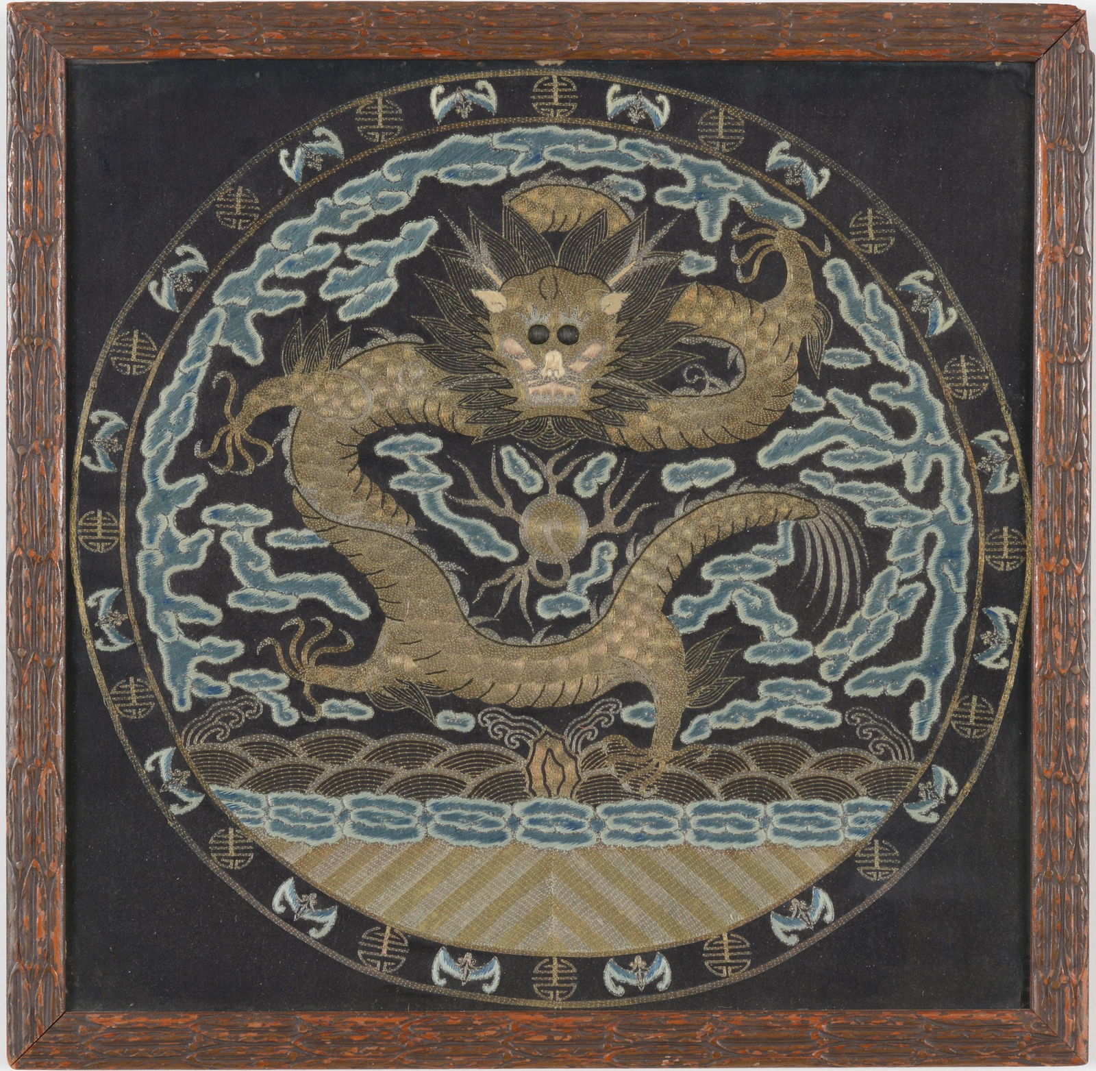 Textile panel. China. Early 20th century. Dragon roundel. Framed and glazed. 12 x 12in. (1 of 5)
