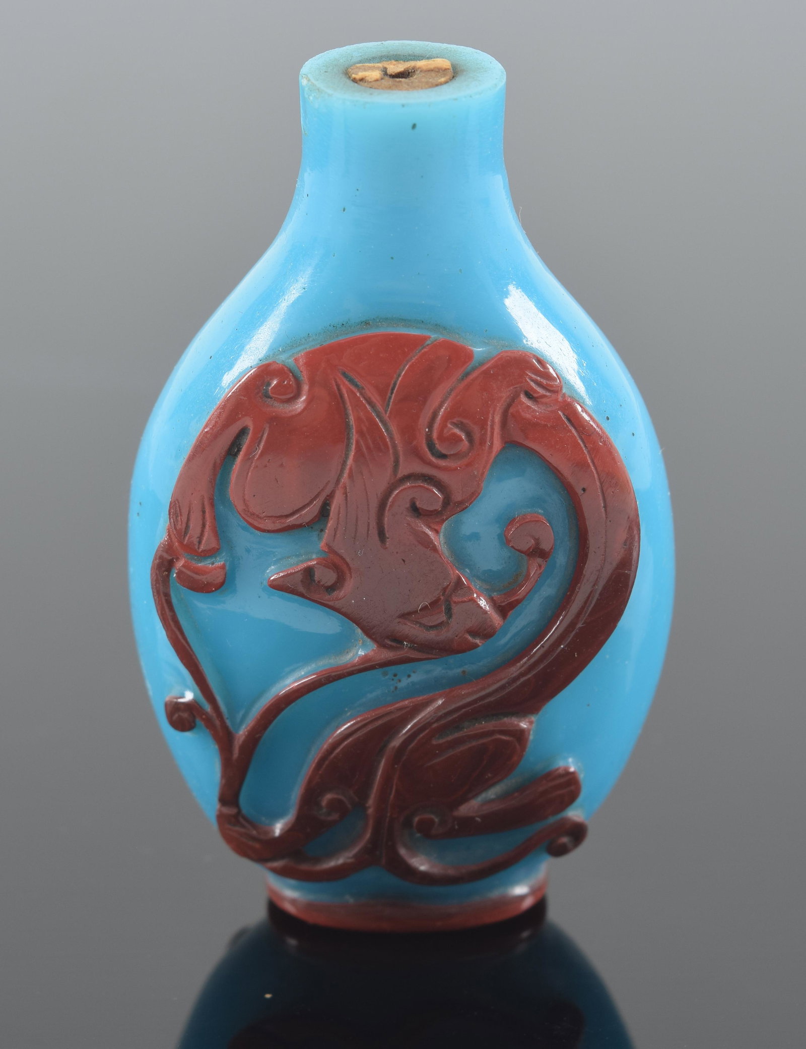 Peking glass snuff bottle. China. 19th century. Overlay red on turquoise. 2.25in H. (1 of 5)