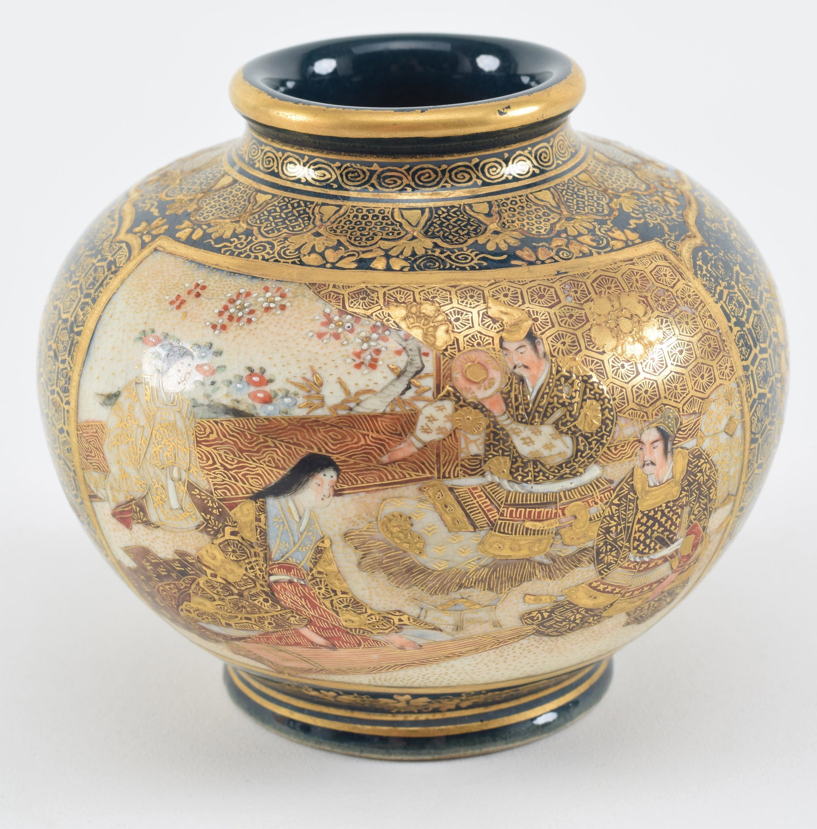 Satsuma vase. Japan. Meiji period (1868-1912). Court scenes on a gilt teal ground. Globular form.: Satsuma vase. Japan. Meiji period (1868-1912). Court scenes on a gilt teal ground. Globular form. Signed Kinkozan. 3.5 D x 3in H.