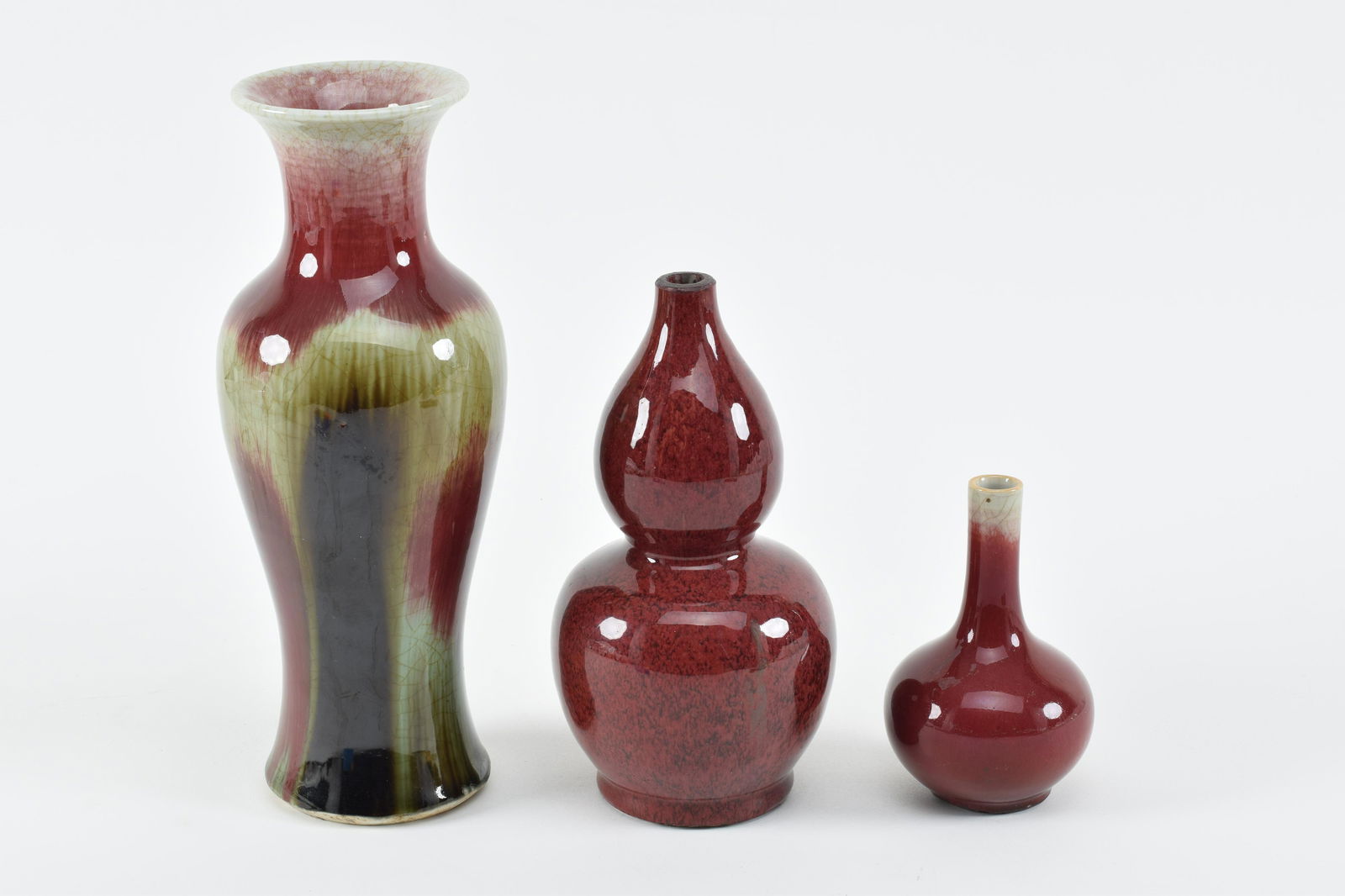 Lot of 3 porcelain vases. China. 19th century. To include a lang yao double gourd vase (truncated) (1 of 12)