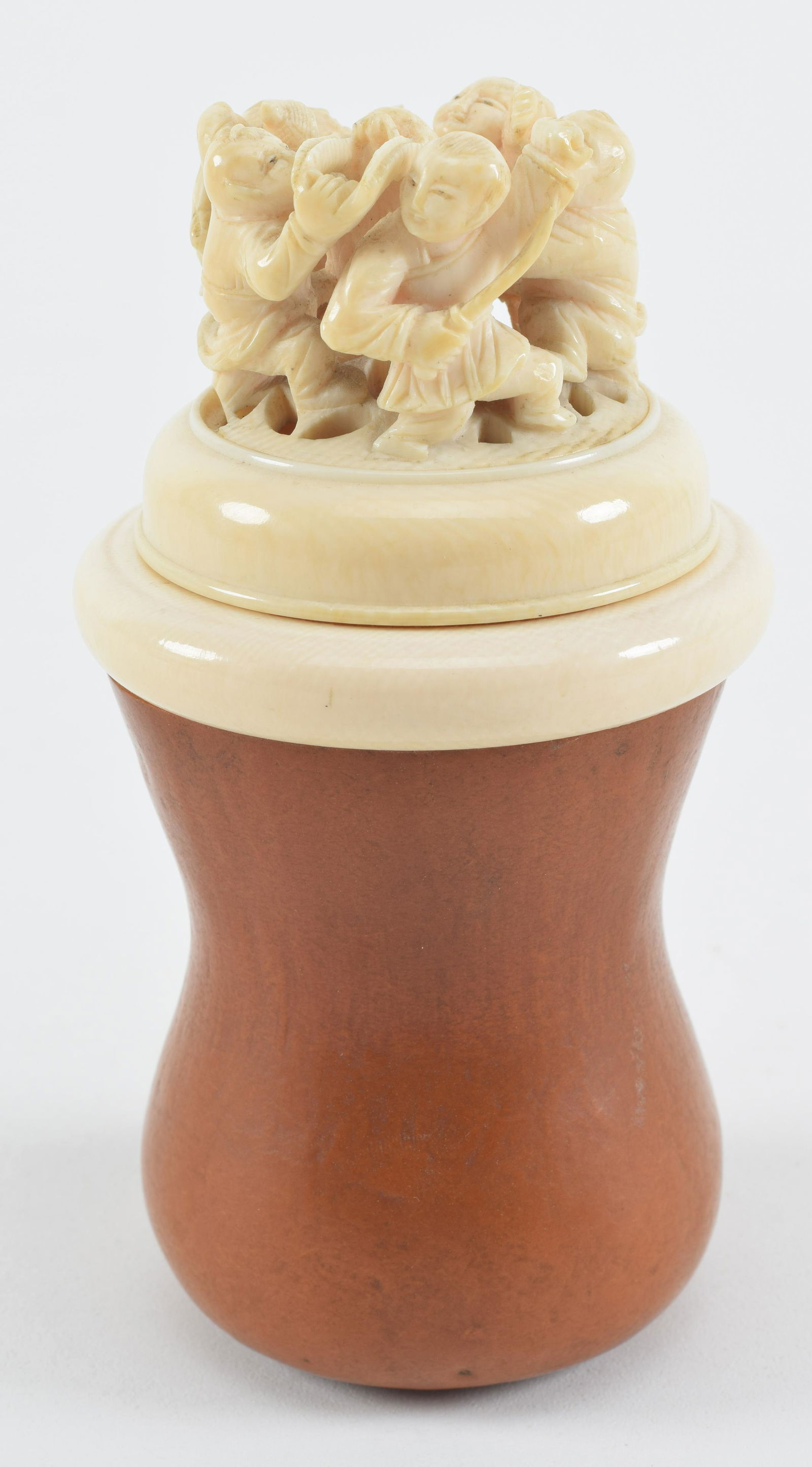 Cricket container. China. 18th century. Top carved in the round with a scene of children playing. (1 of 6)