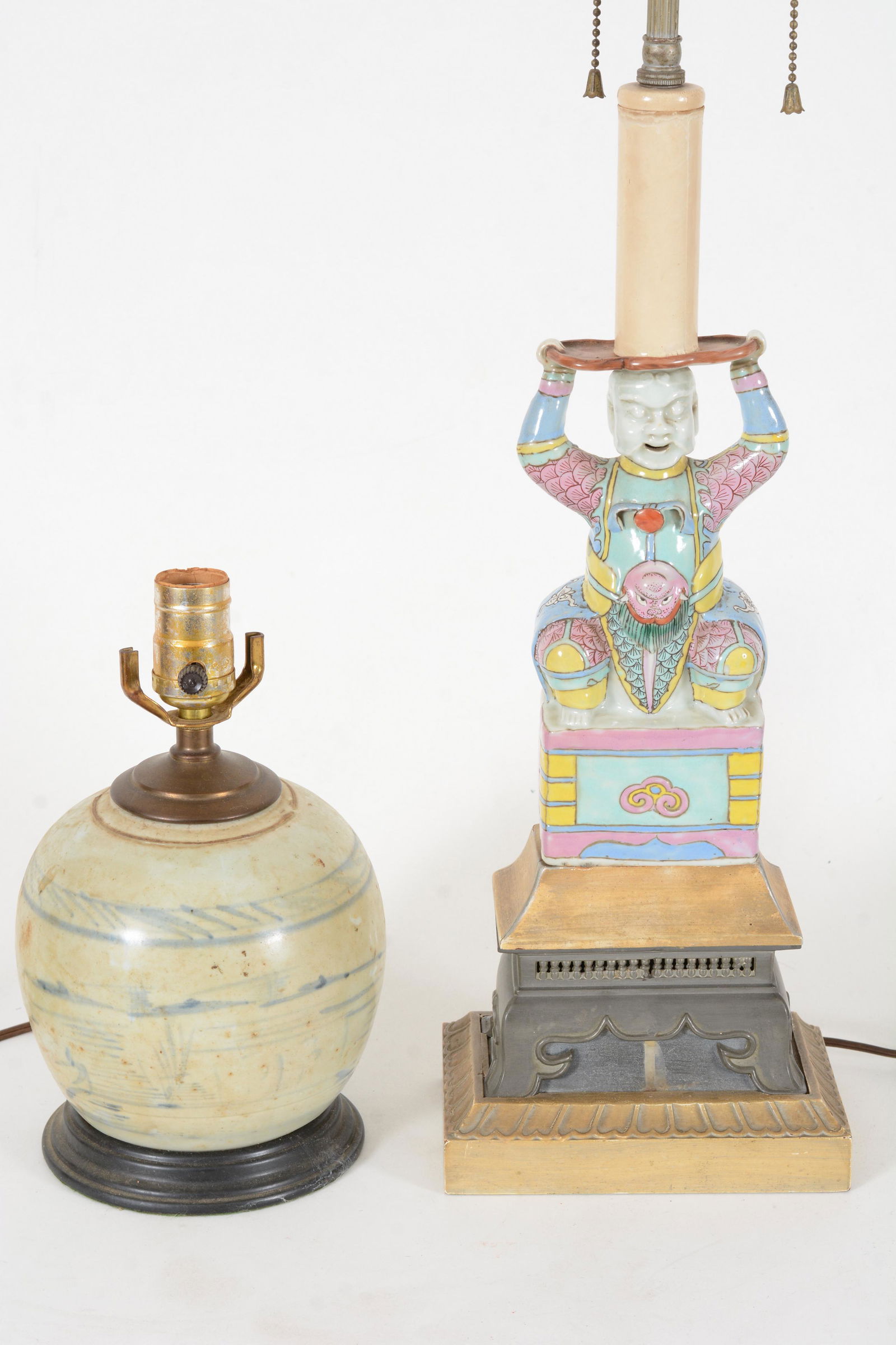 Lot of 2 items. To include an 18th century Chinese export candle stand in the form of a warrior, 9in (1 of 3)