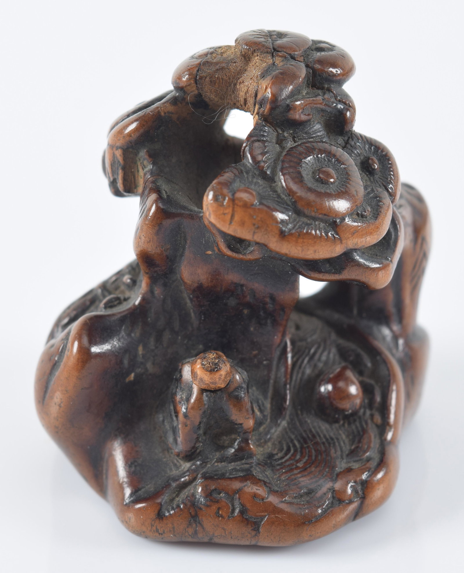 Carved wooden netsuke. Japan. 18th century. Landscape in the round. 1.75in H. Provenance: From the (1 of 5)