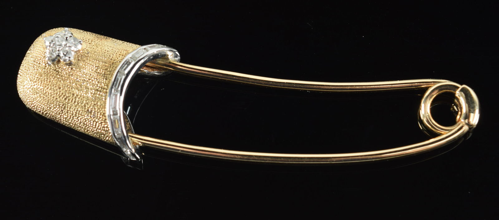 14K gold heavy diamond mounted safety pin design pin. 2 color gold. Stippled decoration. Tests as (1 of 4)