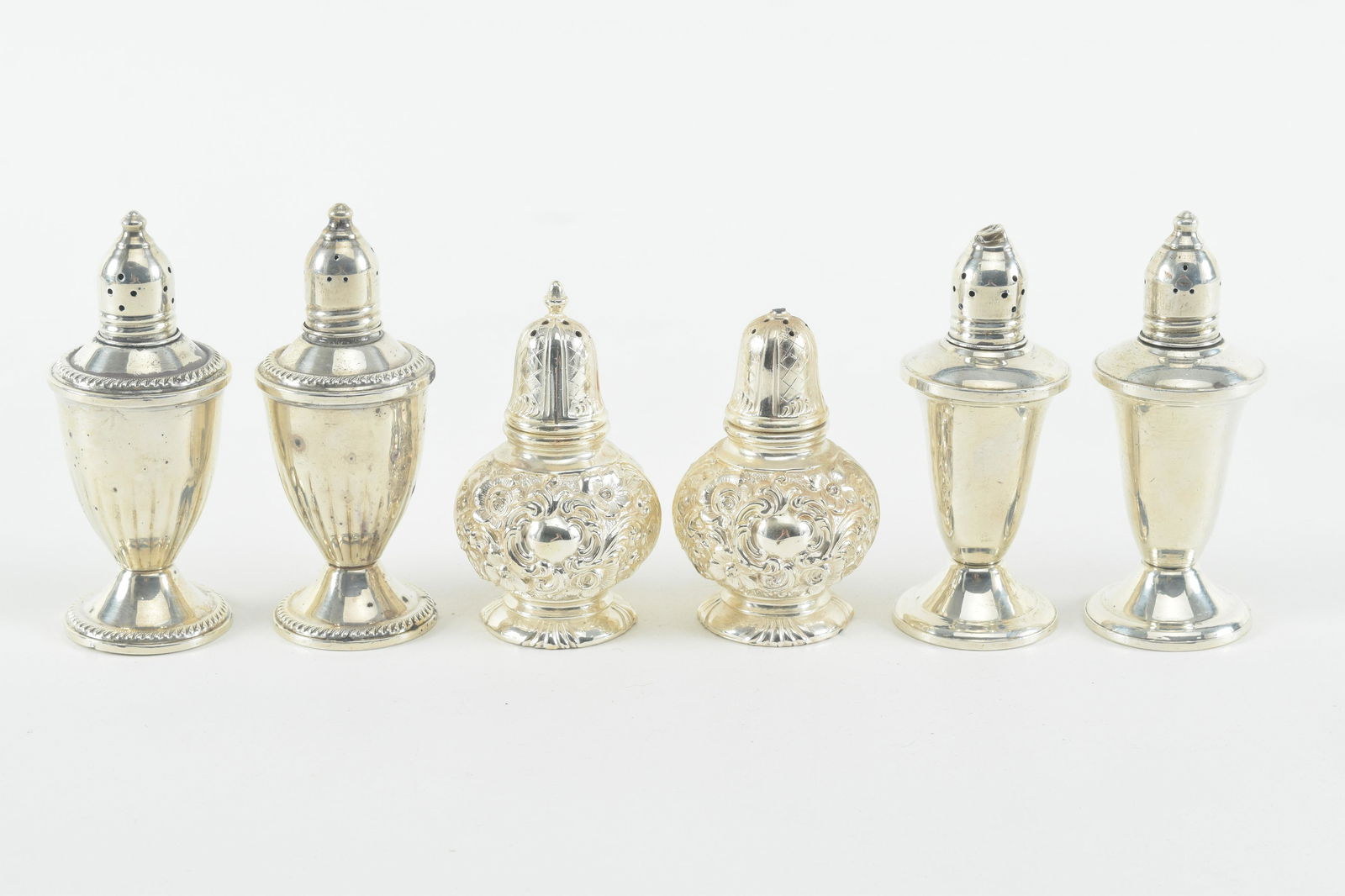 Lot of 3 pairs of salt and pepper shakers. 2 sterling and one plated silver (1 of 7)