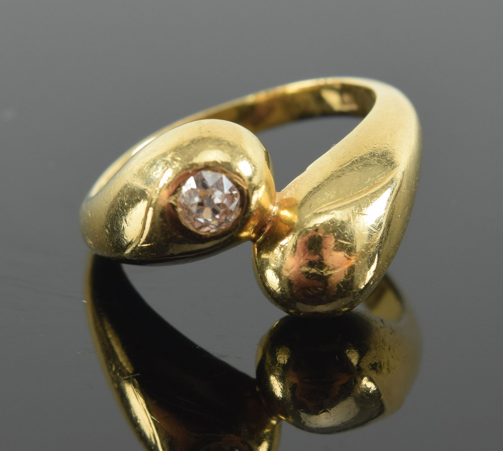 18K gold Elizabeth Gage diamond mounted bypass form ring with round cut stone. Marked GAGE and 750 (1 of 6)