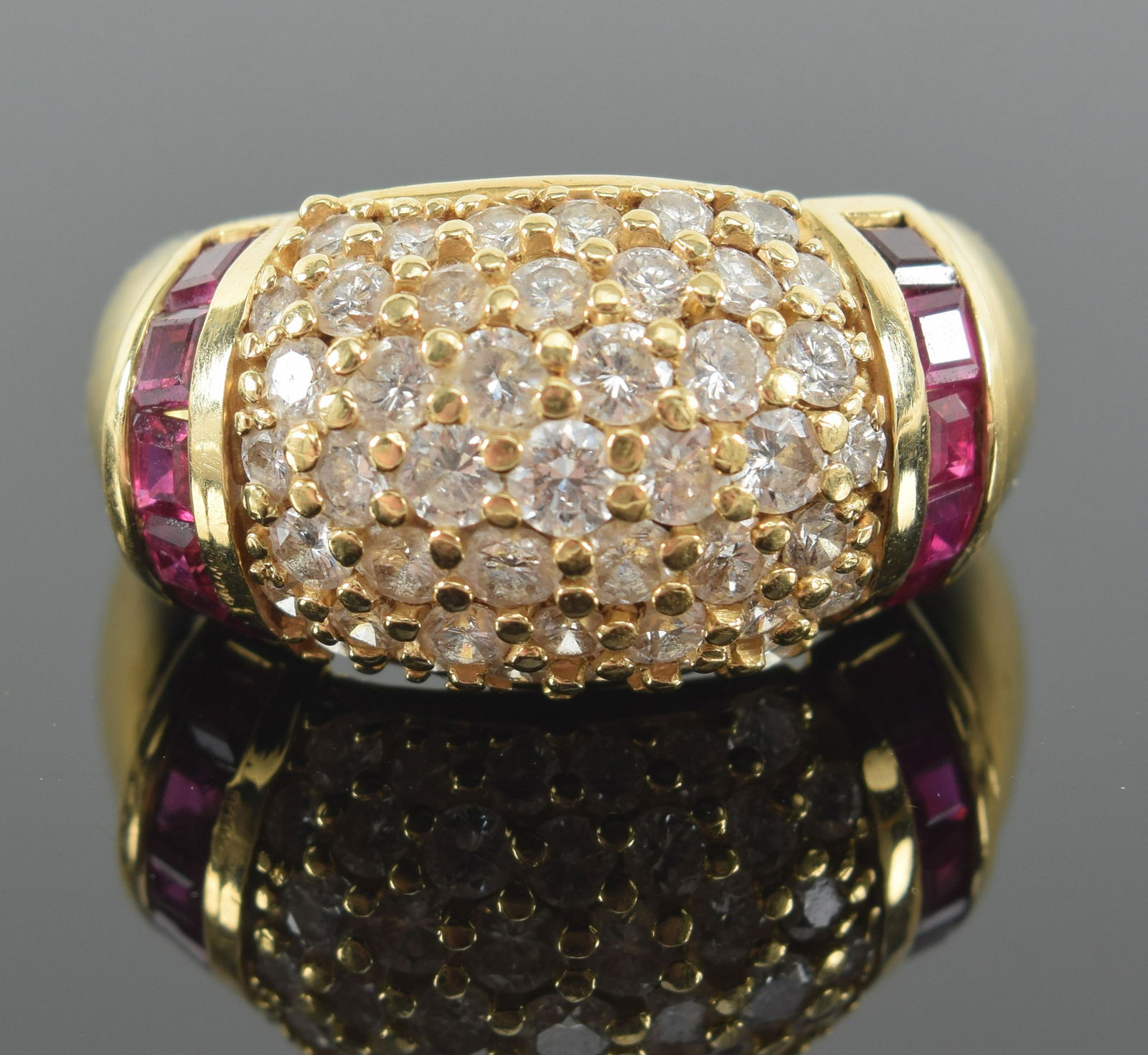 18K gold ruby and diamond mounted ring. Marked 18K faintly. Also unusual makers mark. Ring size 7. (1 of 7)