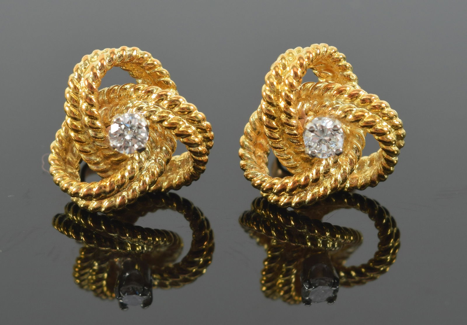 18K Gold and diamond knot earrings; 4.71 grams. (1 of 5)